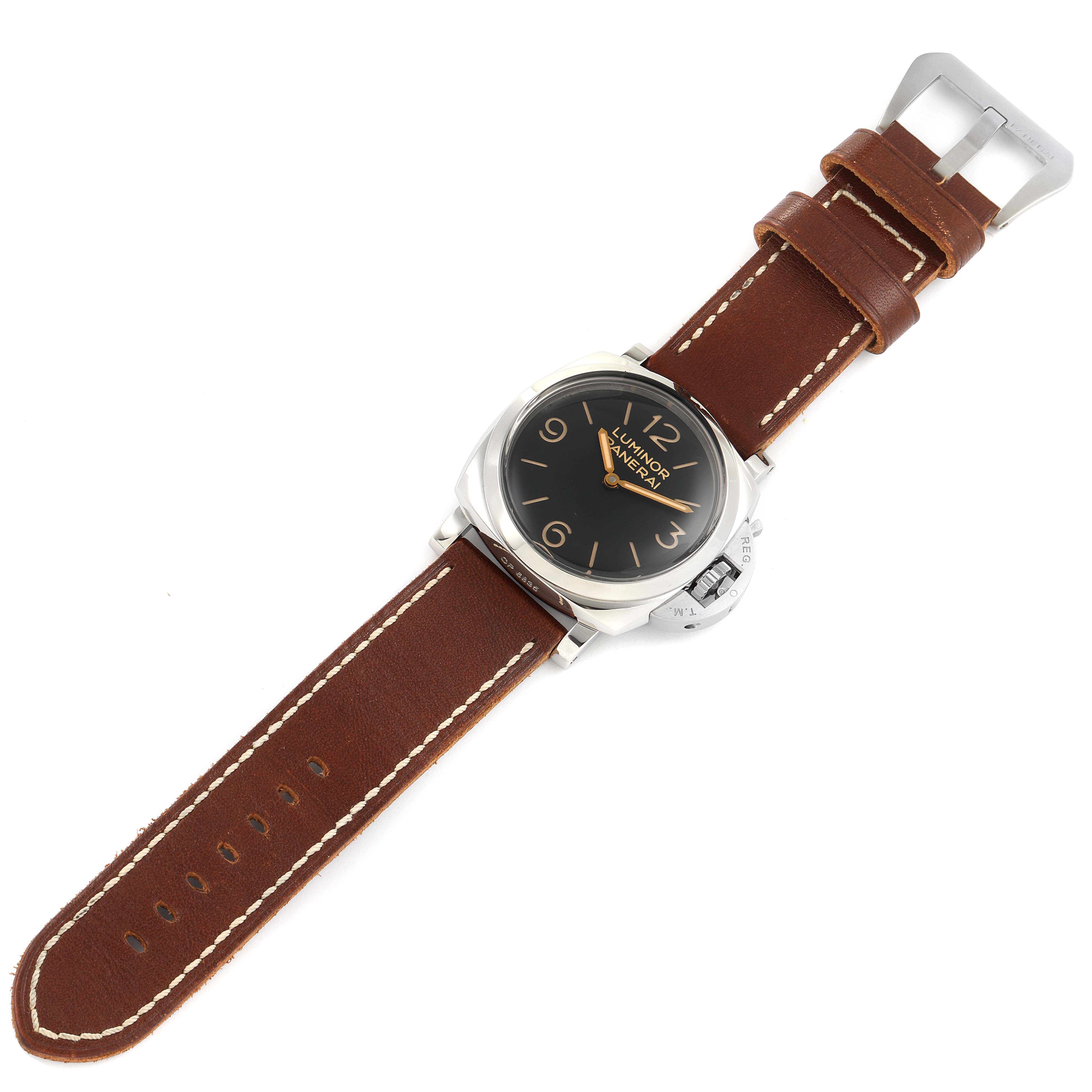The image shows a Panerai Luminor PAM00372 Men
s Stainless Steel Black Dial PAM00372 Men
s Stainless Steel Black Dial watch from a top-down angle, highlighting its brown leather strap and black dial.