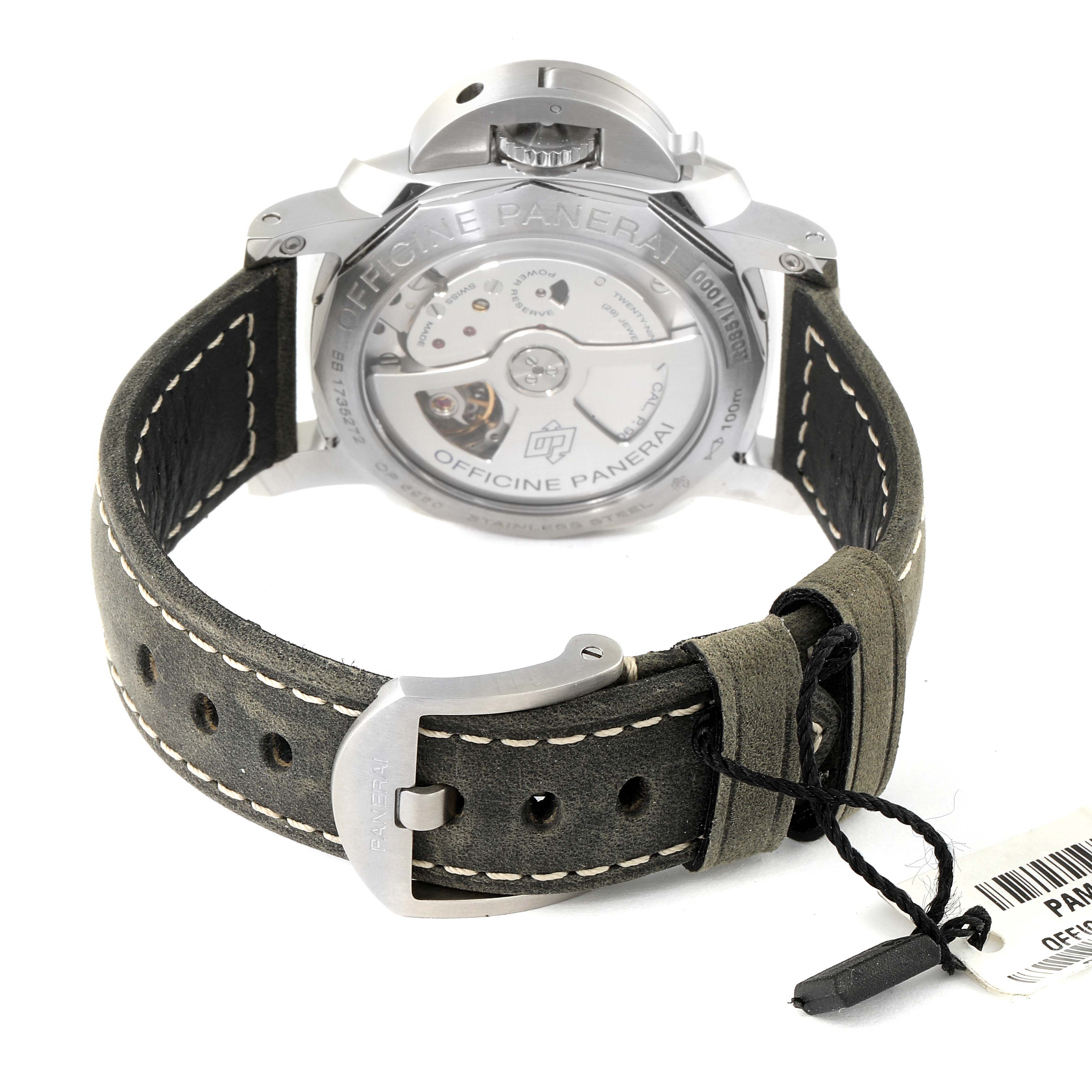 The image shows the back view of a Panerai Luminor PAM00535 Men
s Stainless Steel Black Dial PAM00535 Men
s Stainless Steel Black Dial watch, highlighting its transparent case back and leather strap with a buckle.