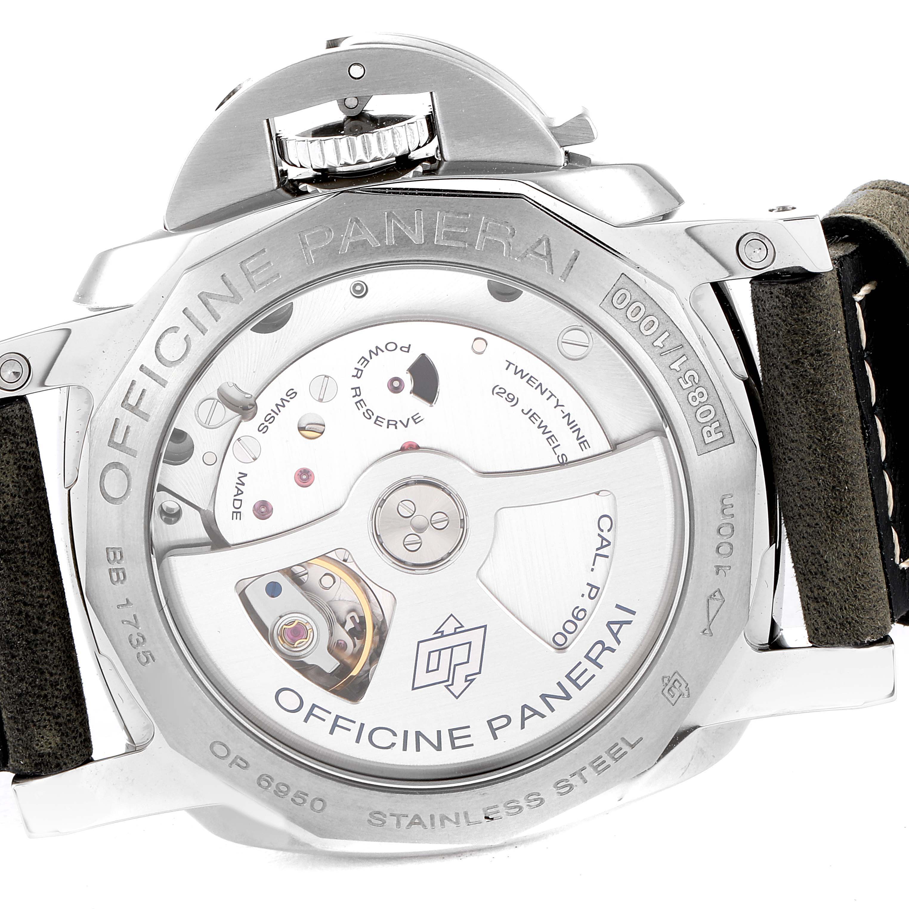 The image shows the back of a Panerai Luminor PAM00535 Men
s Stainless Steel Black Dial PAM00535 Men
s Stainless Steel Black Dial watch, highlighting its movement and inner components.