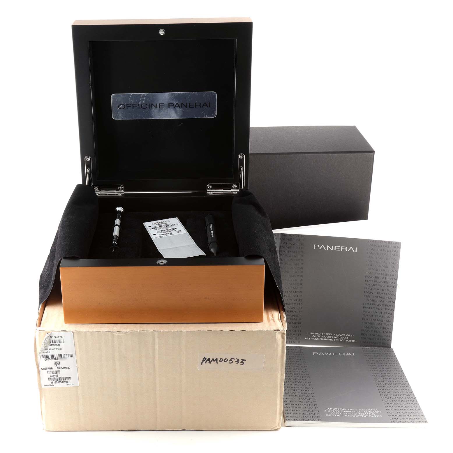 The image shows the Panerai Luminor PAM00535 Men
s Stainless Steel Black Dial PAM00535 Men
s Stainless Steel Black Dial watch box, tools, manuals, and outer cardboard packaging.