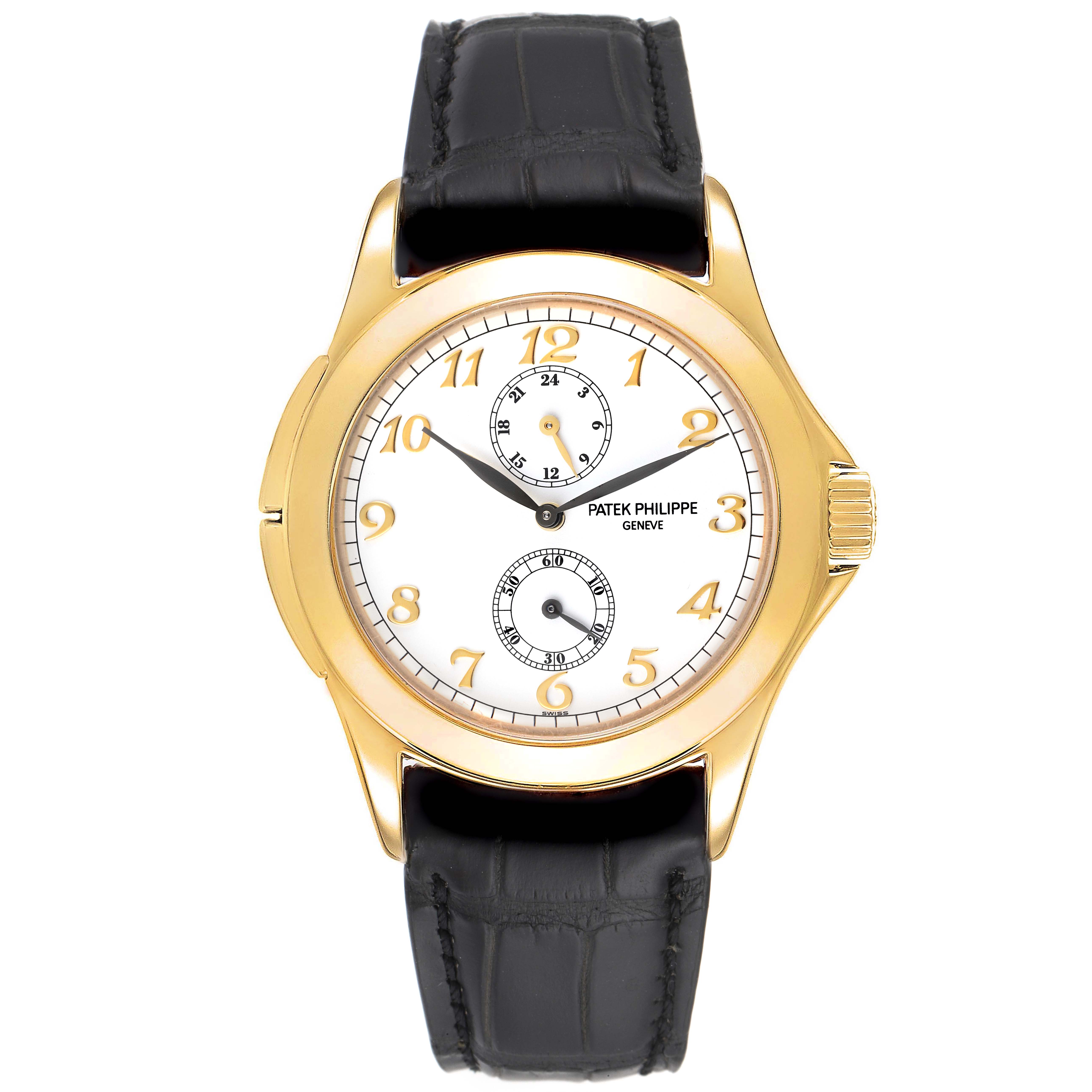 This Patek Philippe Calatrava 5134J Men's Yellow Gold White Dial 5134J Men's Yellow Gold White Dial watch is shown from a top-down angle, highlighting its face, gold case, and black leather strap.