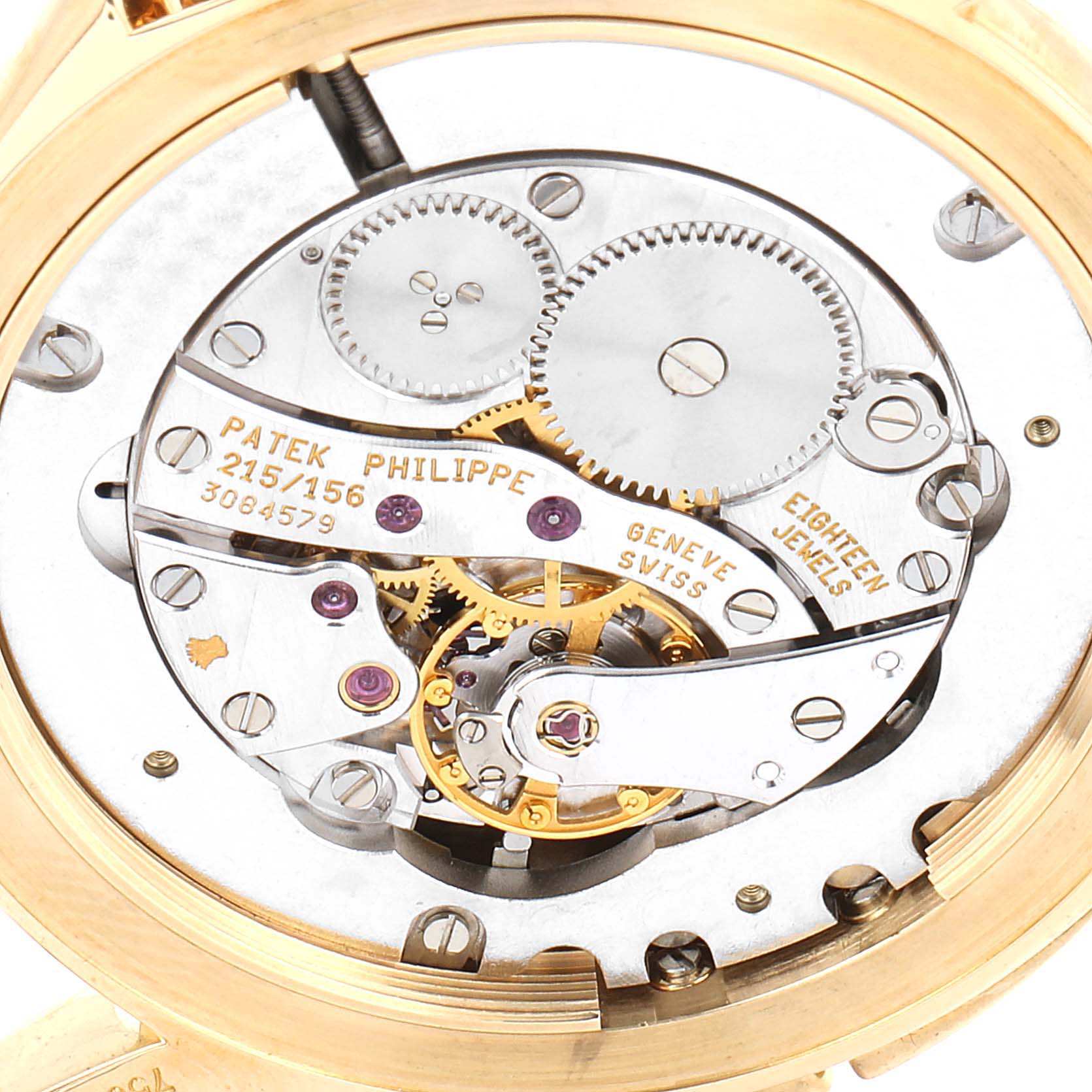 The image shows a close-up angle of the movement mechanism of the Calatrava model by Patek Philippe.