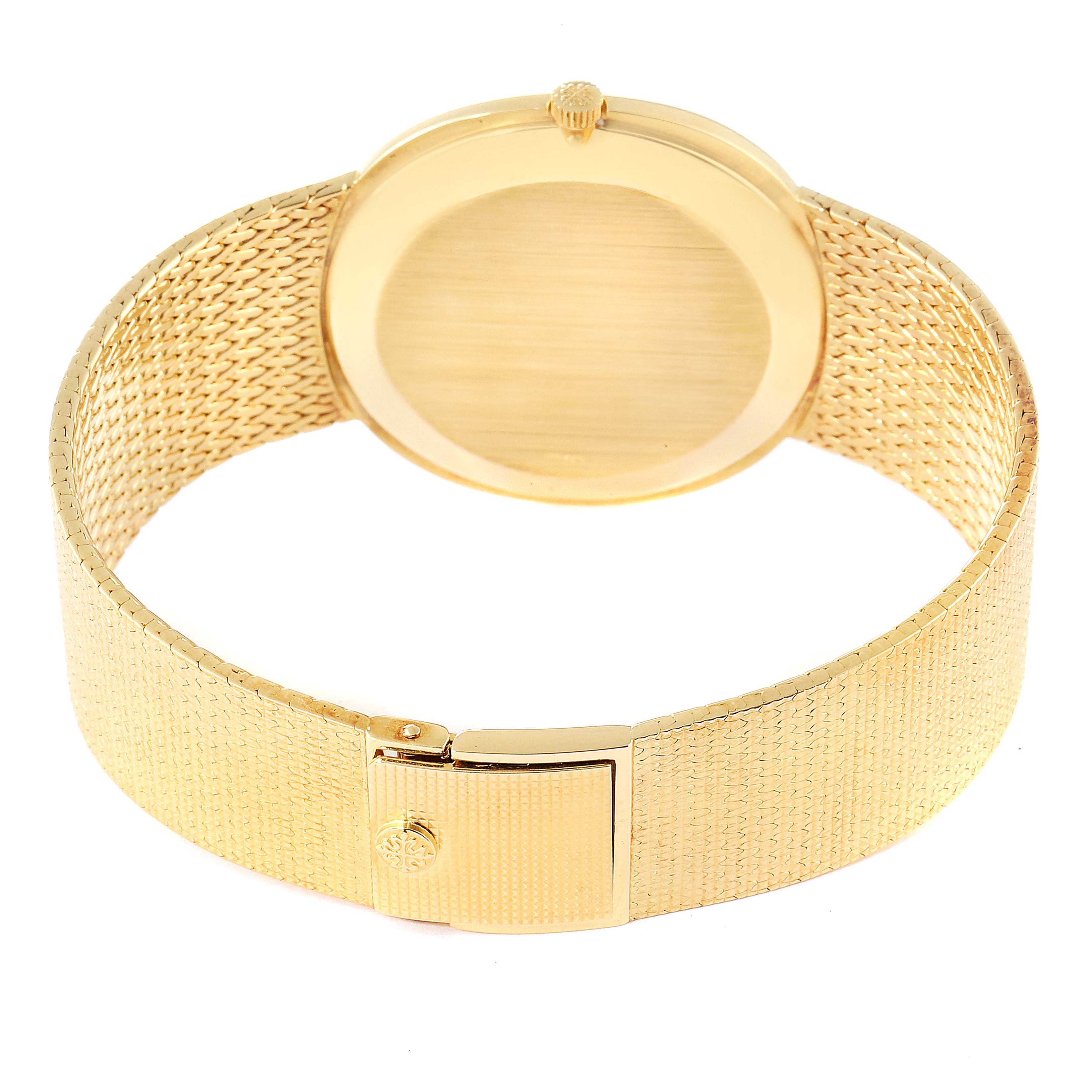 The image shows the back view of the Patek Philippe Golden Ellipse 3879 Men's Yellow Gold Silver Dial 3879 Men's Yellow Gold Silver Dial watch, highlighting its clasp and bracelet.