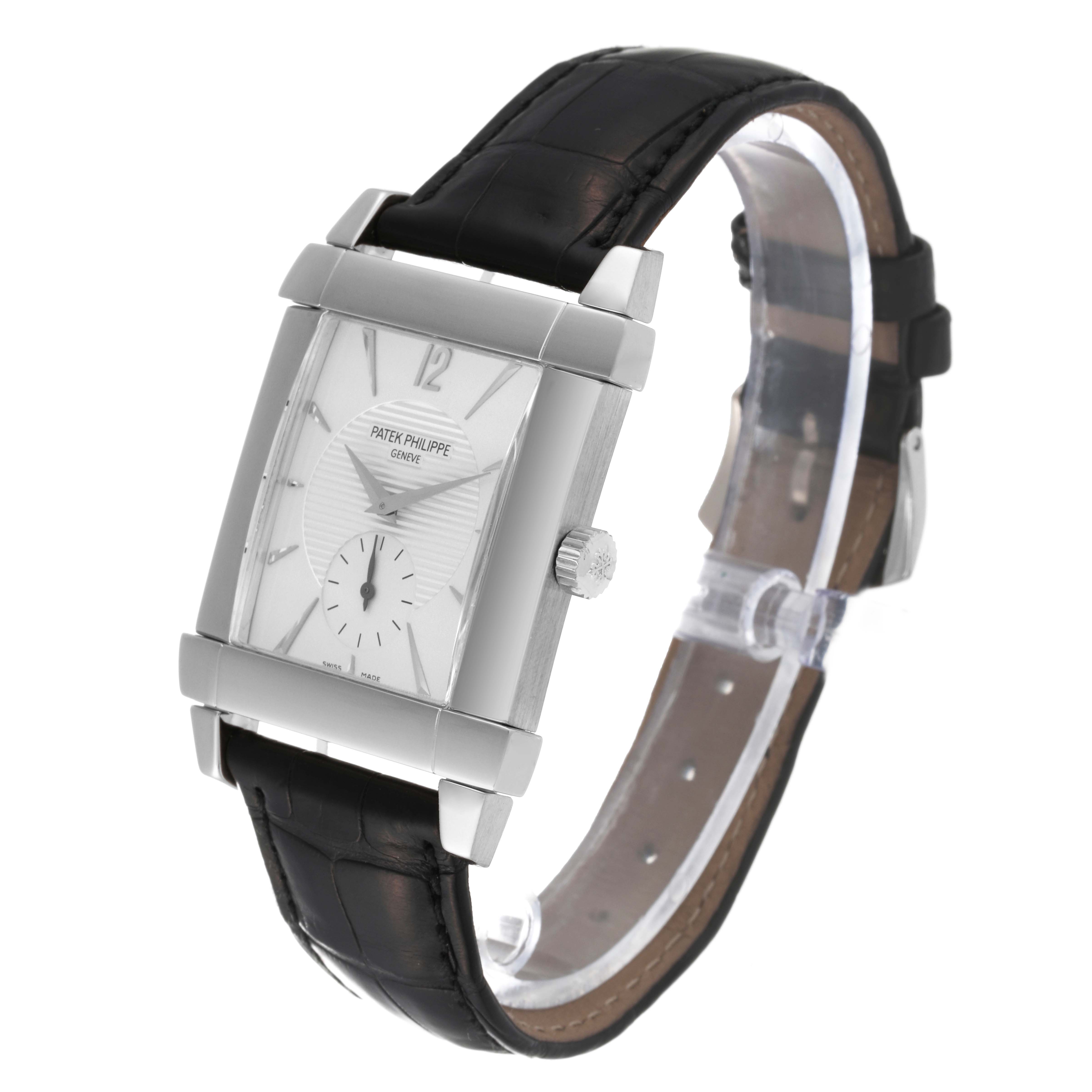The image shows a side-front angle of the Patek Philippe Gondolo 5111G-001 Men's White Gold Silver Dial 5111G-001 Men's White Gold Silver Dial watch, highlighting its rectangular face and black leather strap.