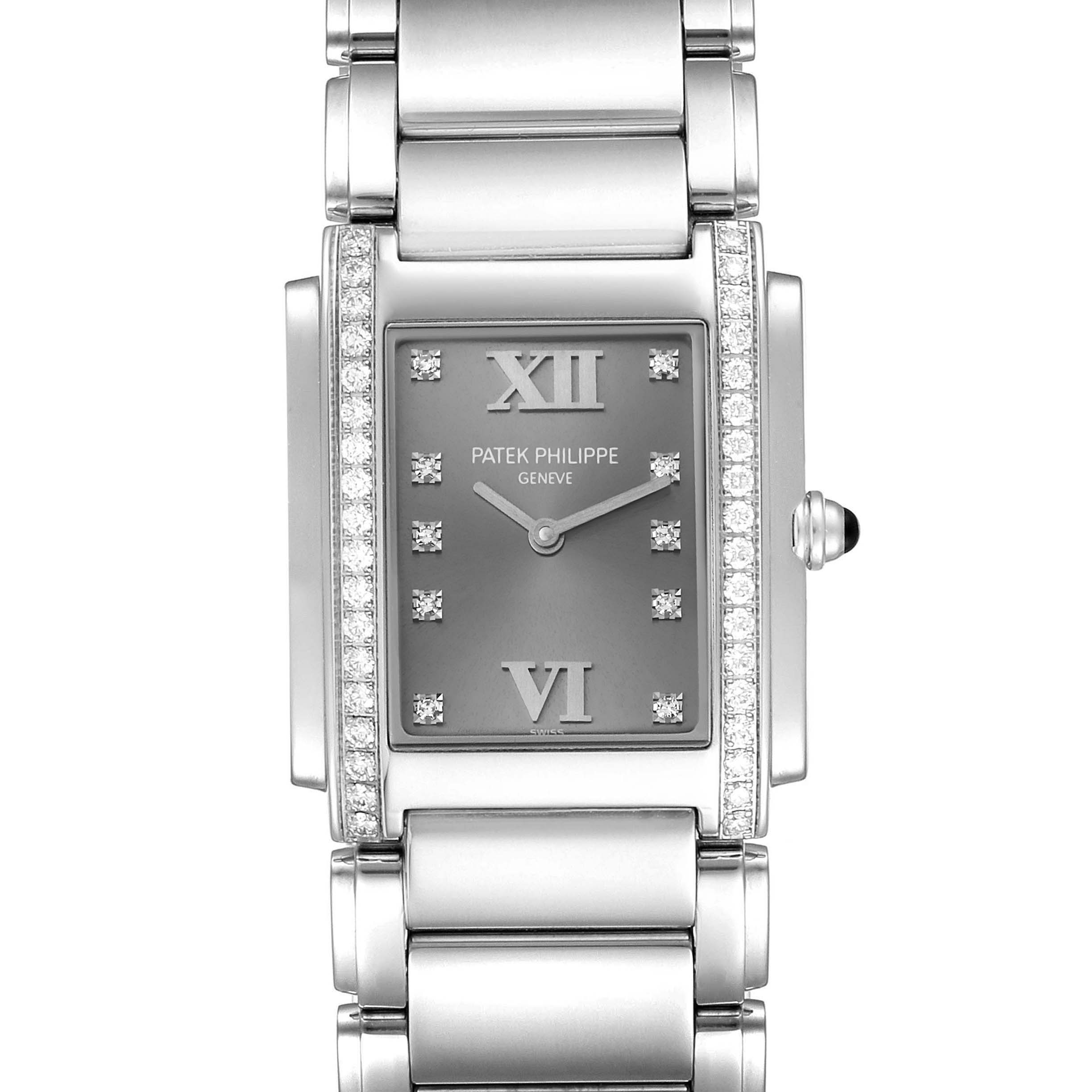 This image shows a front view of a Patek Philippe Twenty-4 4910/10A-010 Women's Stainless Steel Grey Dial 4910/10A-010 Women's Stainless Steel Grey Dial watch, highlighting its rectangular face and metal bracelet.