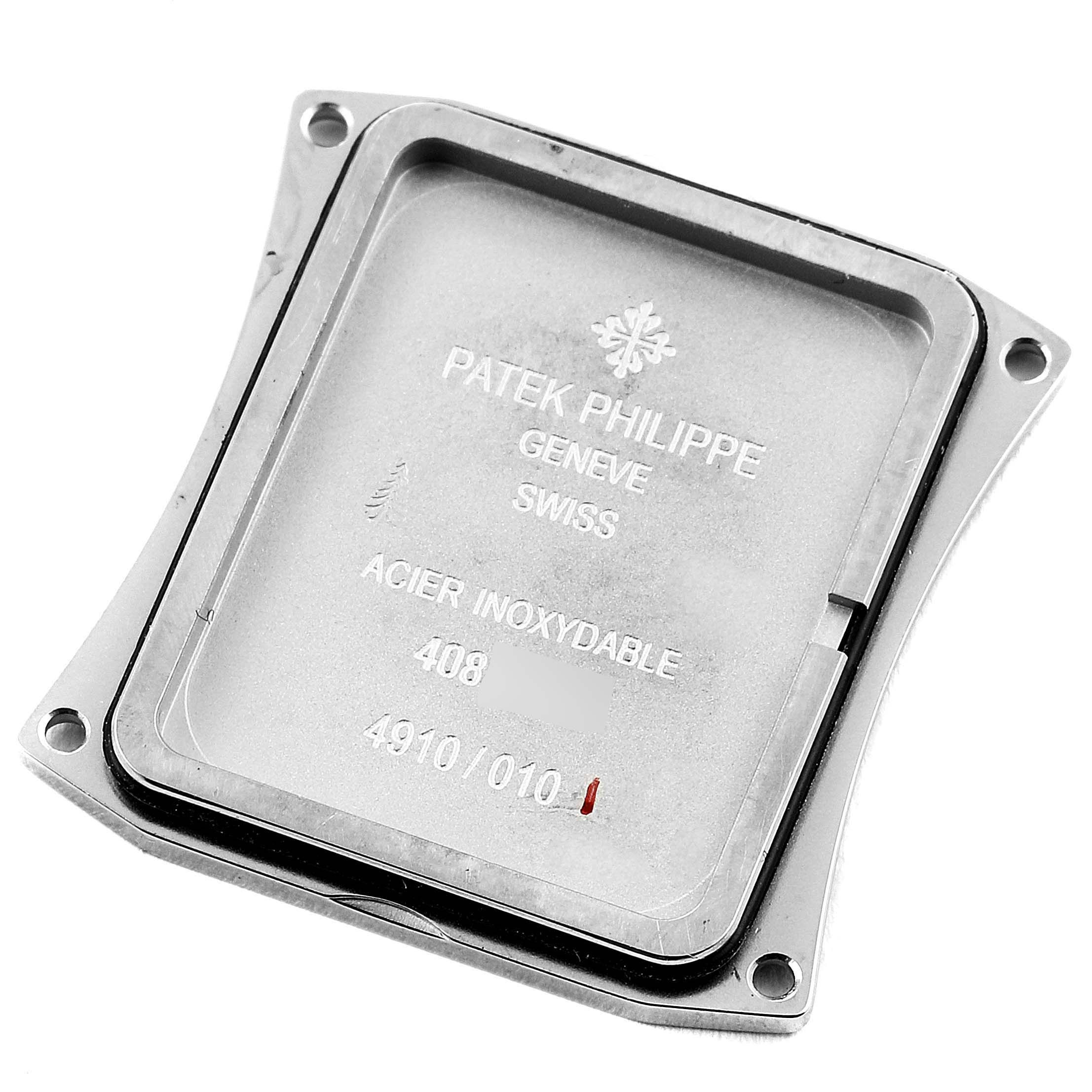 This image shows the back case of the Patek Philippe Twenty-4 4910/10A-010 Women's Stainless Steel Grey Dial 4910/10A-010 Women's Stainless Steel Grey Dial watch model, highlighting its inscriptions and details.