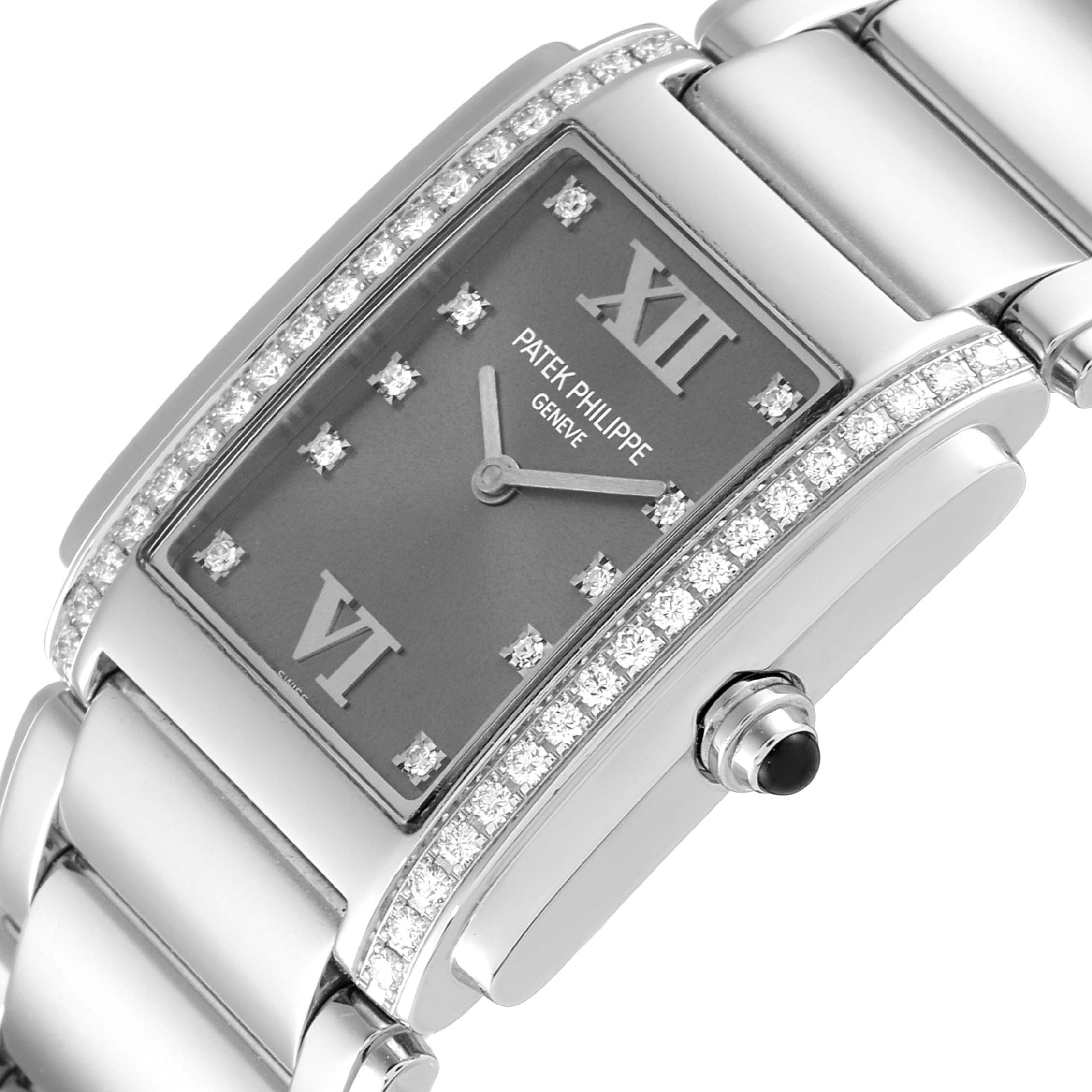 This image shows a Patek Philippe Twenty-4 4910/10A-010 Women's Stainless Steel Grey Dial 4910/10A-010 Women's Stainless Steel Grey Dial model watch at an angled close-up, highlighting the dial, bezel, and crown.