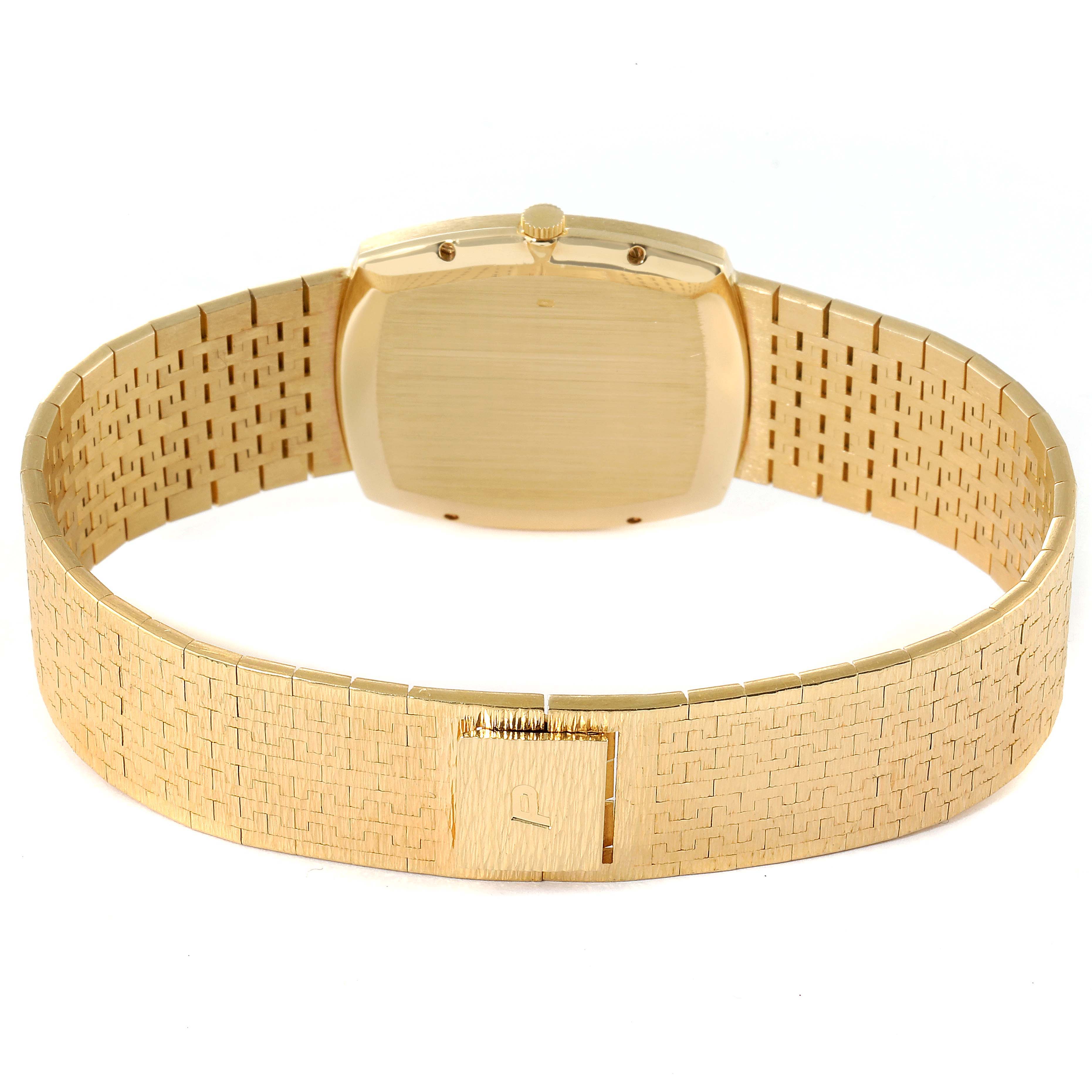 The image shows the back view of the Piaget Men's Yellow Gold Blue Dial Men's Yellow Gold Blue Dial 18k Yellow Gold Blue Lapis Lazuli Stone Dial Vintage Men's Watch, highlighting the clasp and case back.