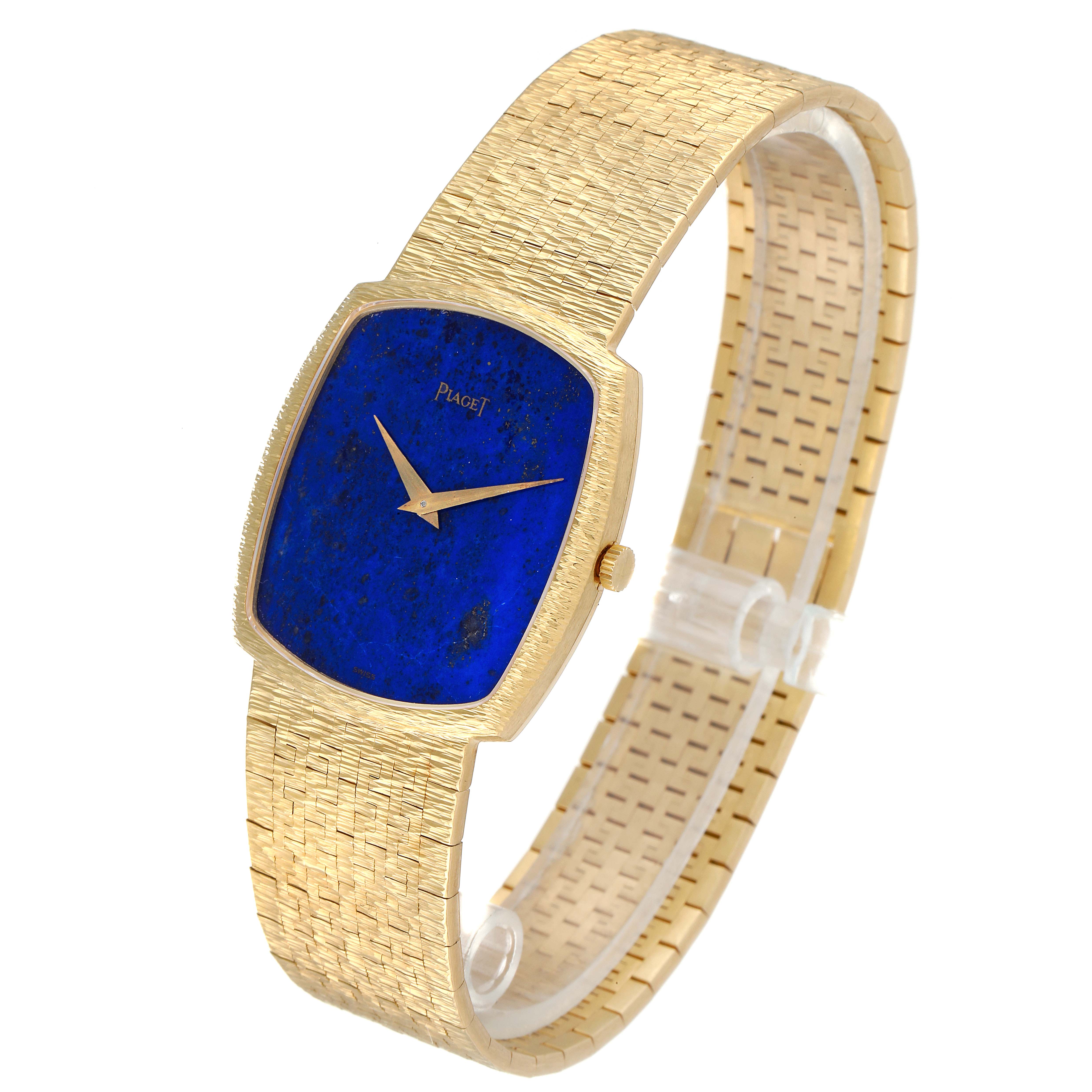 This image shows a Piaget Men's Yellow Gold Blue Dial Men's Yellow Gold Blue Dial 18k Yellow Gold Blue Lapis Lazuli Stone Dial Vintage Mens Watch from an angled side view, highlighting the dial and band.