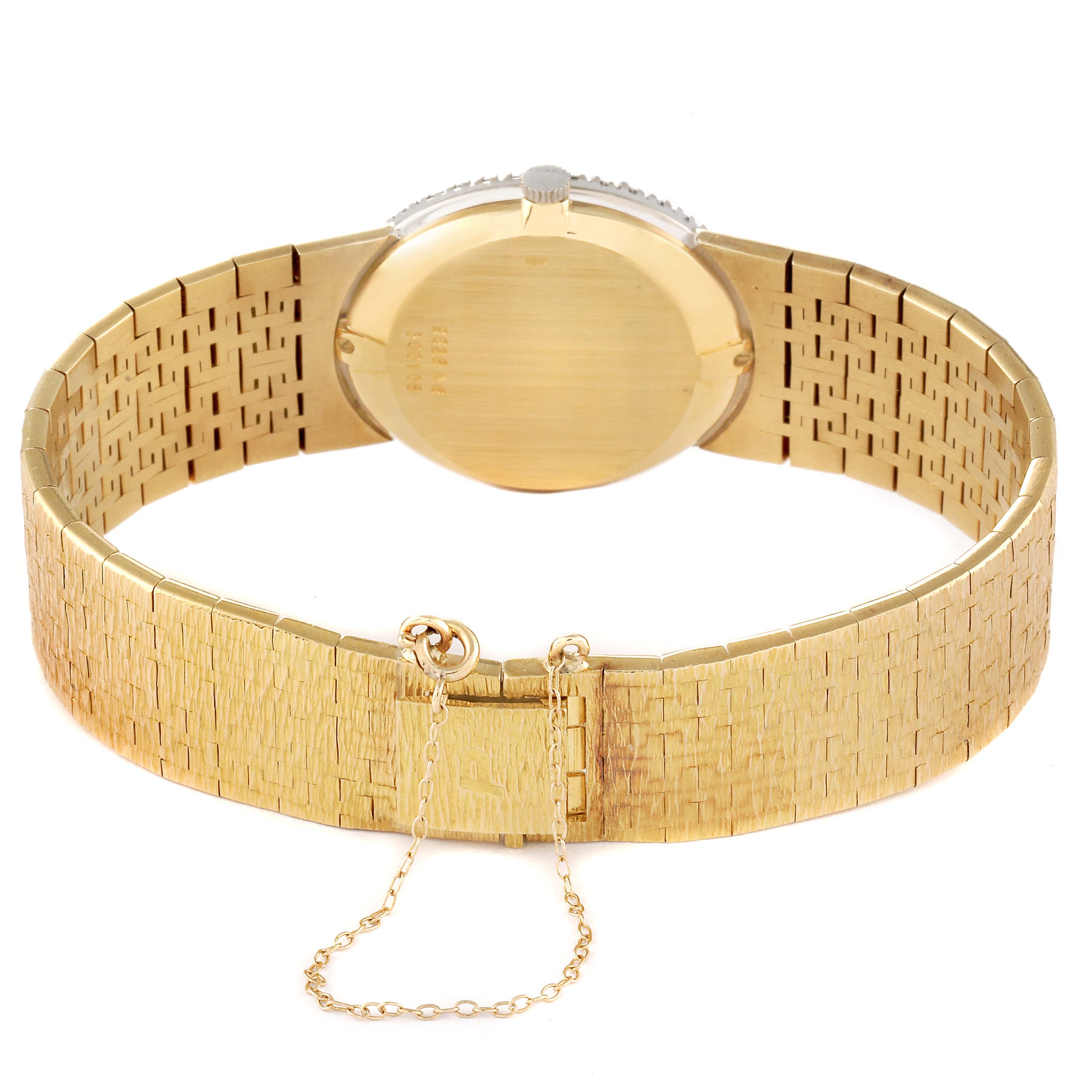 The image shows the back of the Piaget 9826-A-6 Women's Yellow Gold Brown Dial 9826-A-6 Women's Yellow Gold Brown Dial model 9826 Yellow Gold Diamond Tiger Eye Stone Dial Vintage Cocktail Ladies Watch, displaying the bracelet and clasp.