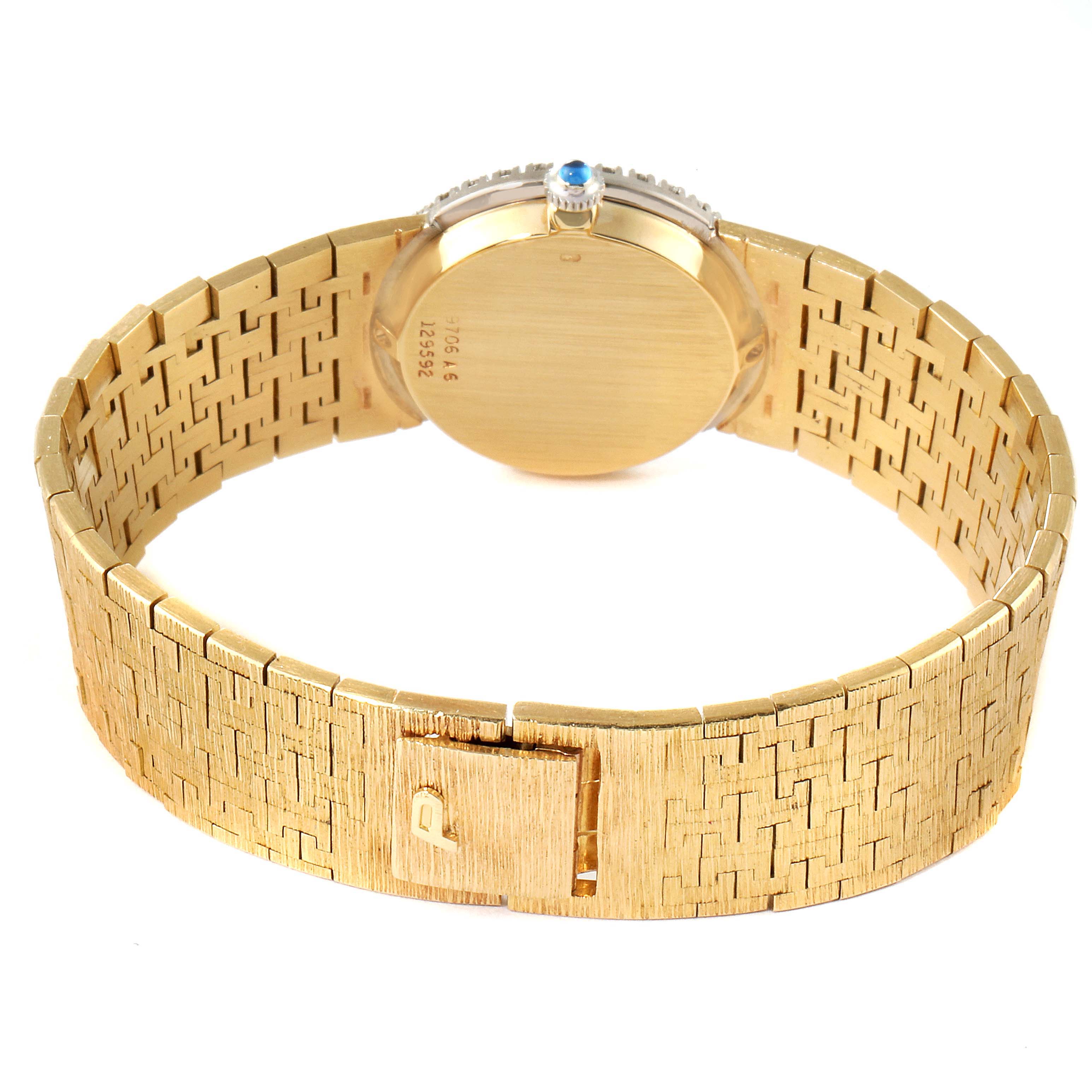The image shows the back and band of the Piaget 9706-A-6 Women's Yellow Gold Blue Dial 9706-A-6 Women's Yellow Gold Blue Dial Yellow Gold Lapis Stone Dial Diamond Sapphire Vintage Cocktail Watch 9706.