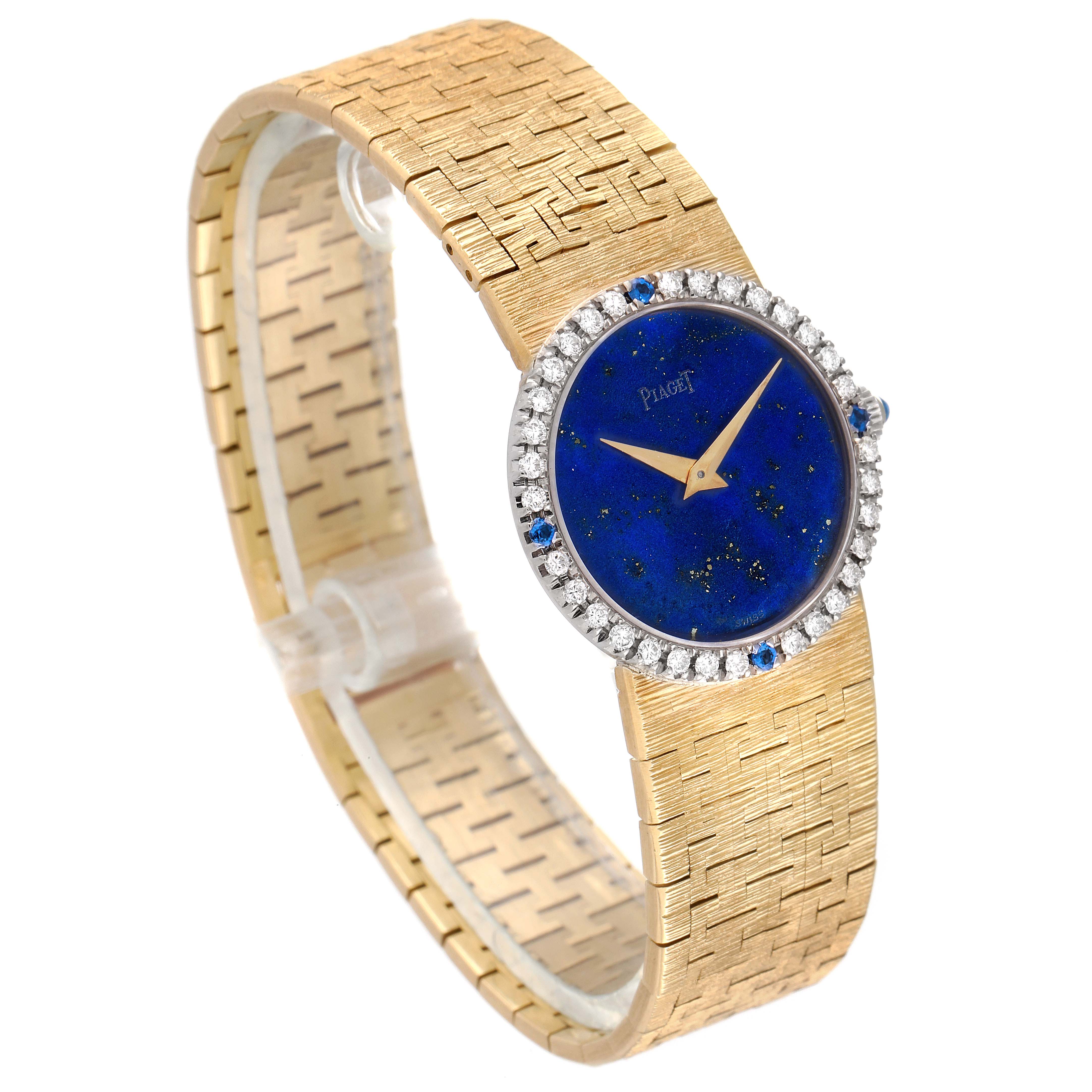 The image shows an angled view of the dial and bracelet of the Piaget 9706-A-6 Women's Yellow Gold Blue Dial 9706-A-6 Women's Yellow Gold Blue Dial Yellow Gold Lapis Stone Dial Diamond Sapphire Vintage Cocktail Watch 9706 model.