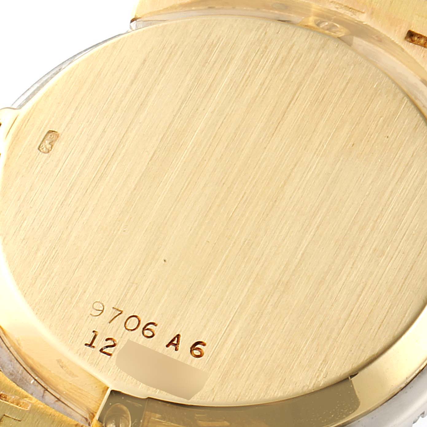 This image shows the back case of the Piaget 9706-A-6 Women's Yellow Gold Blue Dial 9706-A-6 Women's Yellow Gold Blue Dial 9706 Yellow Gold Lapis Stone Dial Diamond Sapphire Vintage Cocktail Watch.