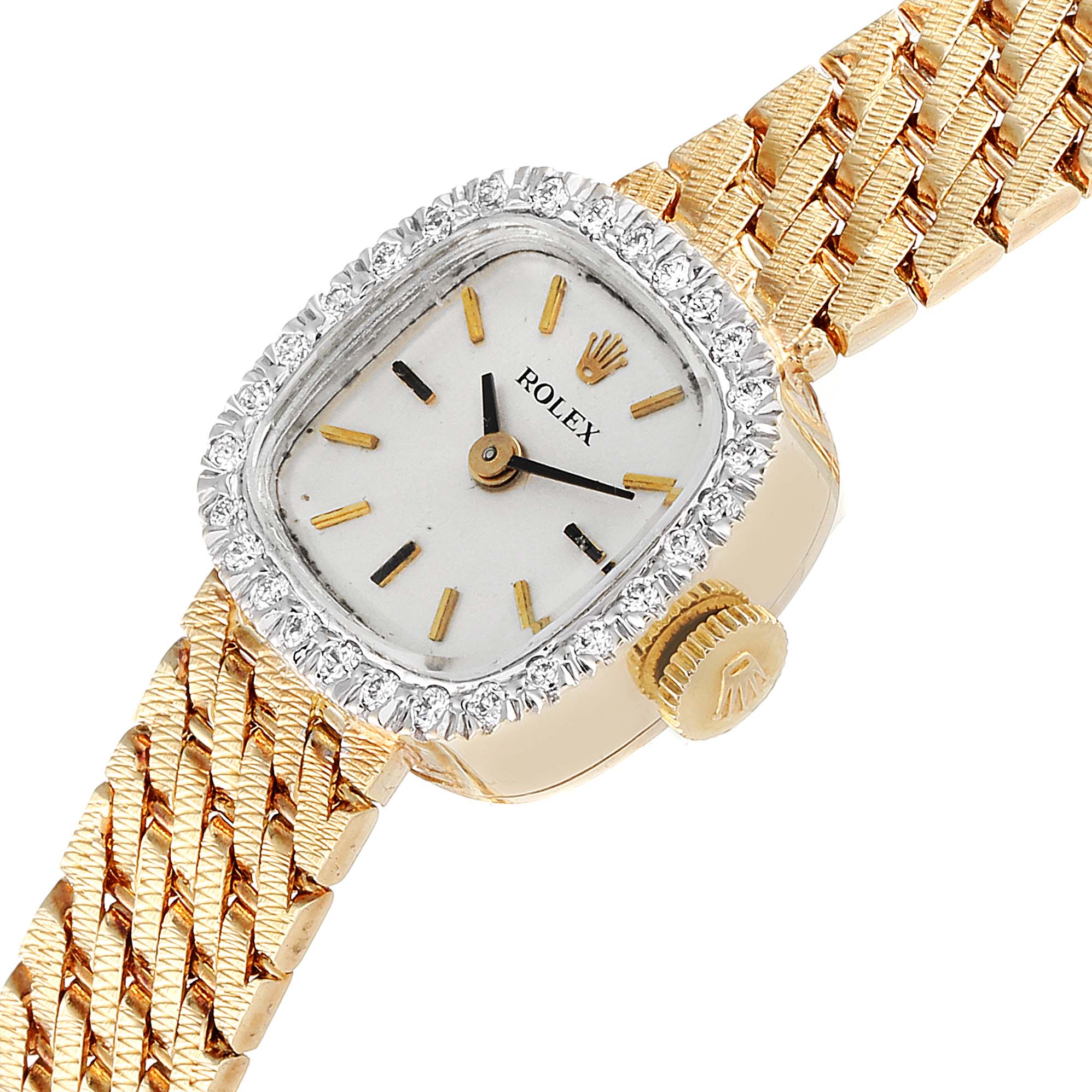 The Rolex Cocktail Women
s Yellow Gold Silver Dial Women
s Yellow Gold Silver Dial watch is angled to display its face, gold band, diamond bezel, and the crown with the Rolex logo.