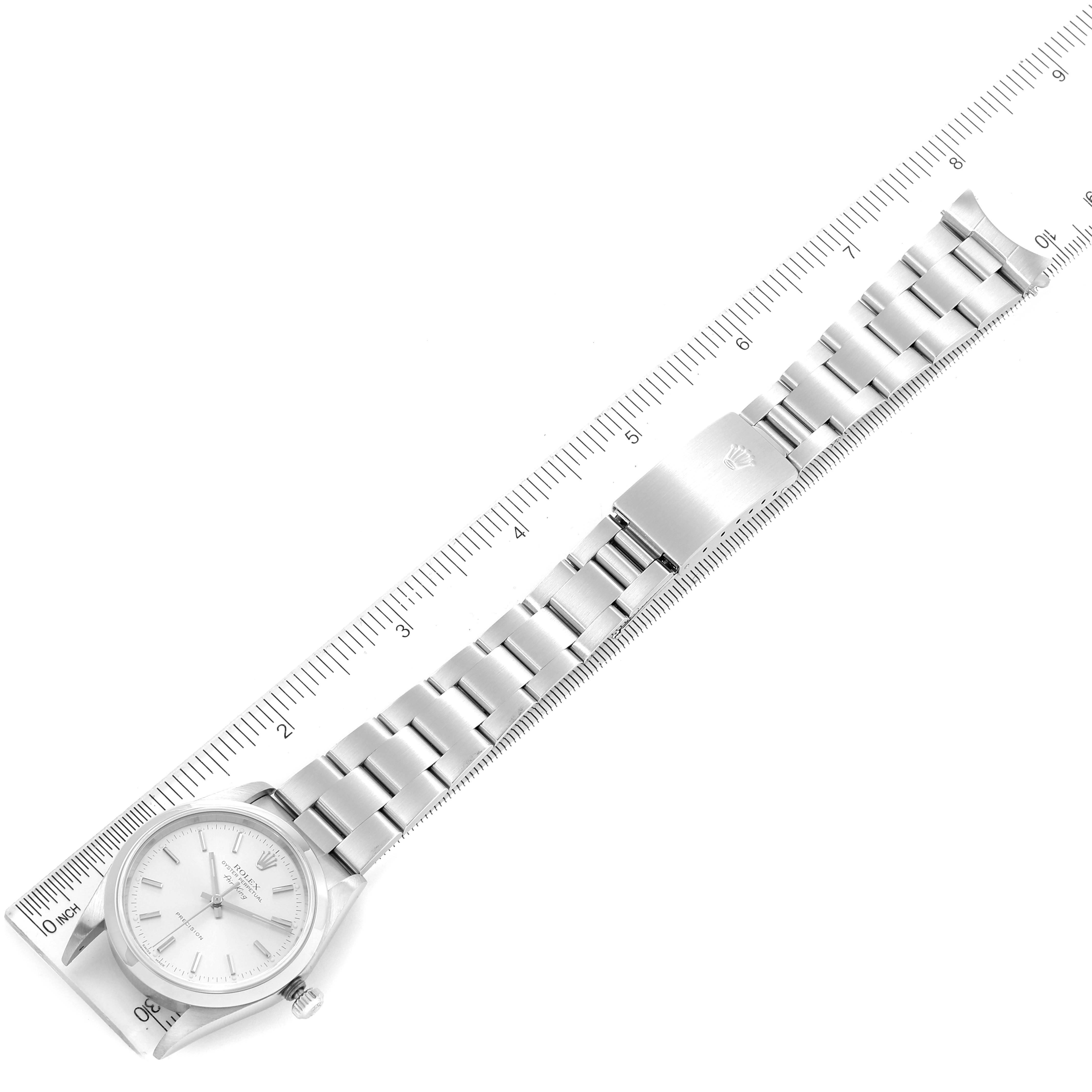 The image shows a top-down view of a Rolex Air-King 14000 Men's Stainless Steel Silver Dial 14000 Men's Stainless Steel Silver Dial watch, focussing on the bracelet laid out against a ruler for scale.