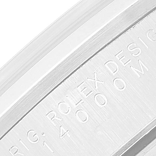 This close-up image features the engraved bezel of the Rolex Air-King 14000 Men's Stainless Steel Silver Dial 14000 Men's Stainless Steel Silver Dial watch.