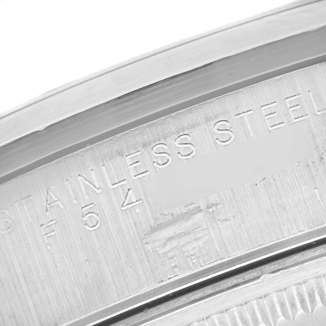 This image shows a close-up of the engraved stainless steel case back of a Rolex Air-King 14000M Men's Stainless Steel Black Dial 14000M Men's Stainless Steel Black Dial watch.