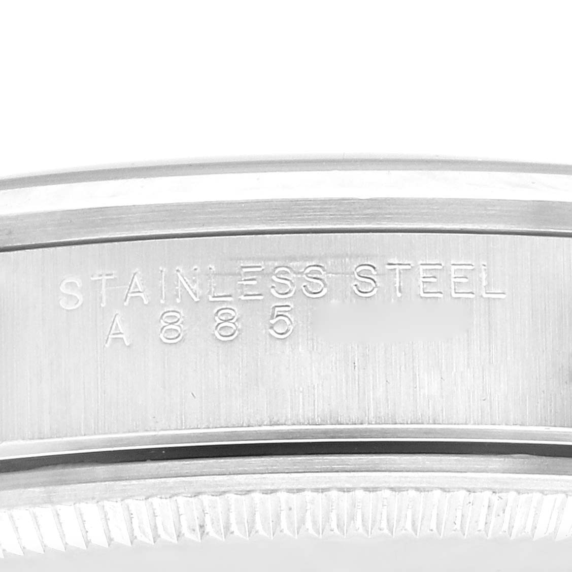 The image shows a close-up of the side of a Rolex Air-King 14000 Men's Stainless Steel Black Dial 14000 Men's Stainless Steel Black Dial watch case with the engraving "STAINLESS STEEL A 885."