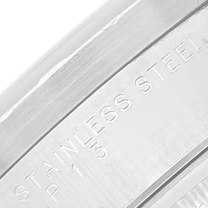 This close-up image shows part of the stainless steel casing of the Rolex Air-King 14010 Men's Stainless Steel Silver Dial 14010 Men's Stainless Steel Silver Dial watch.