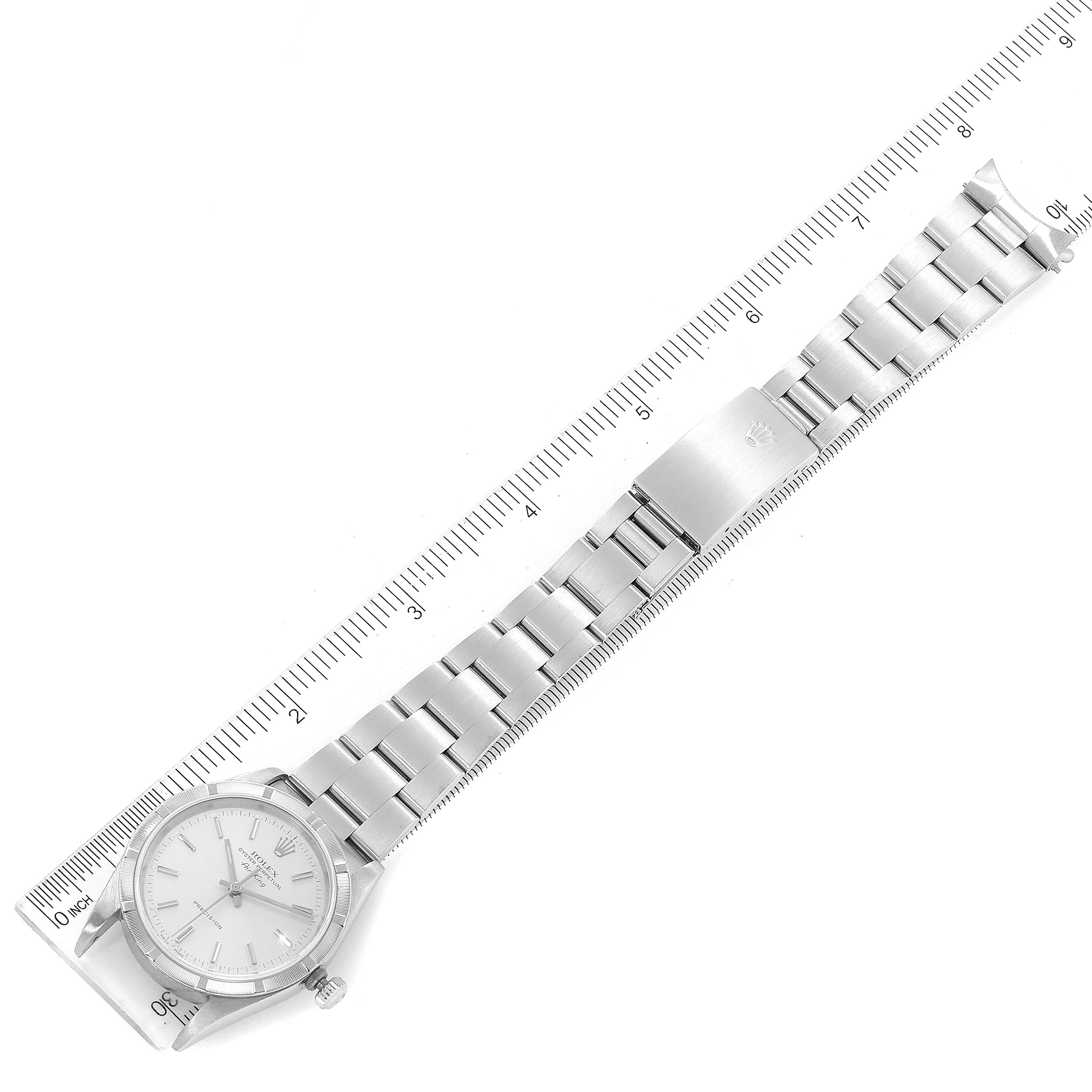 The image shows the full length of a Rolex Air-King 14010 Men's Stainless Steel Silver Dial 14010 Men's Stainless Steel Silver Dial watch, including the dial, bracelet, and clasp, measured alongside a ruler.