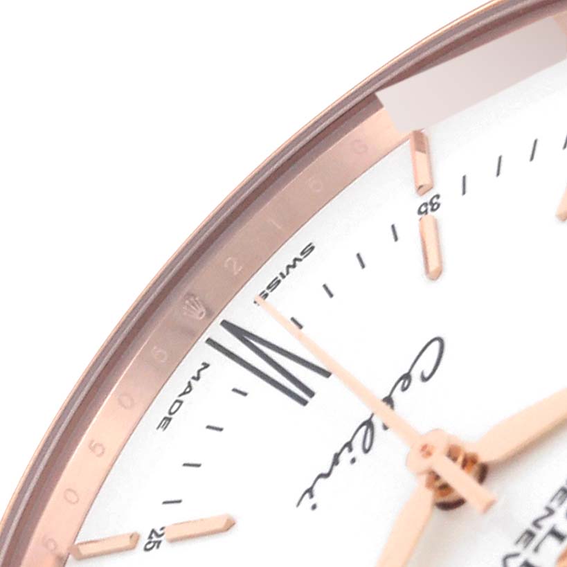 This close-up image of a Rolex Cellini 50505 Men's Rose Gold White Dial 50505 Men's Rose Gold White Dial watch shows part of the dial, watch hands, and hour markers.