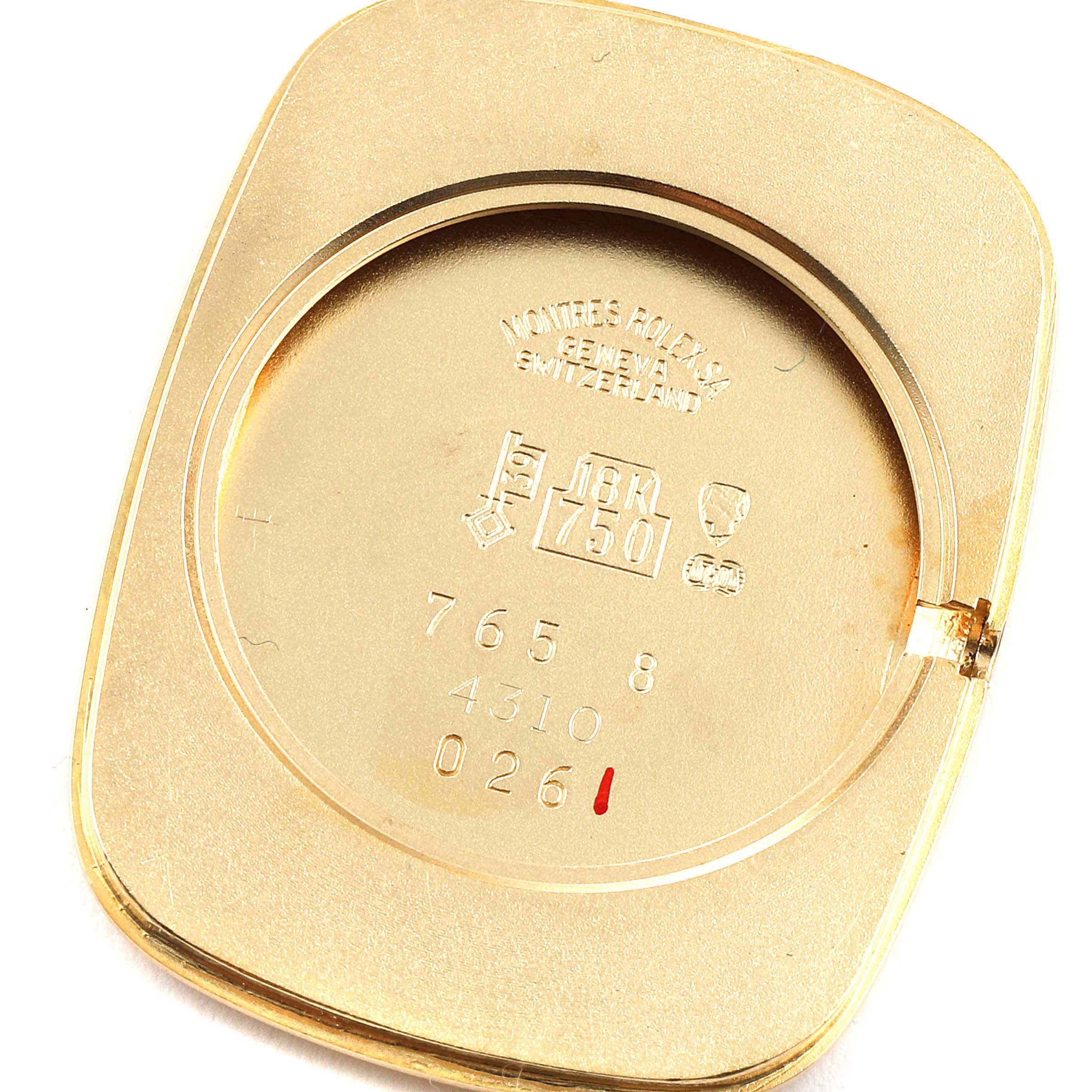 The image shows the inside back cover of a Rolex Cellini 4310 Men's Yellow Gold Champagne Dial 4310 Men's Yellow Gold Champagne Dial watch, displaying engravings and hallmarks.