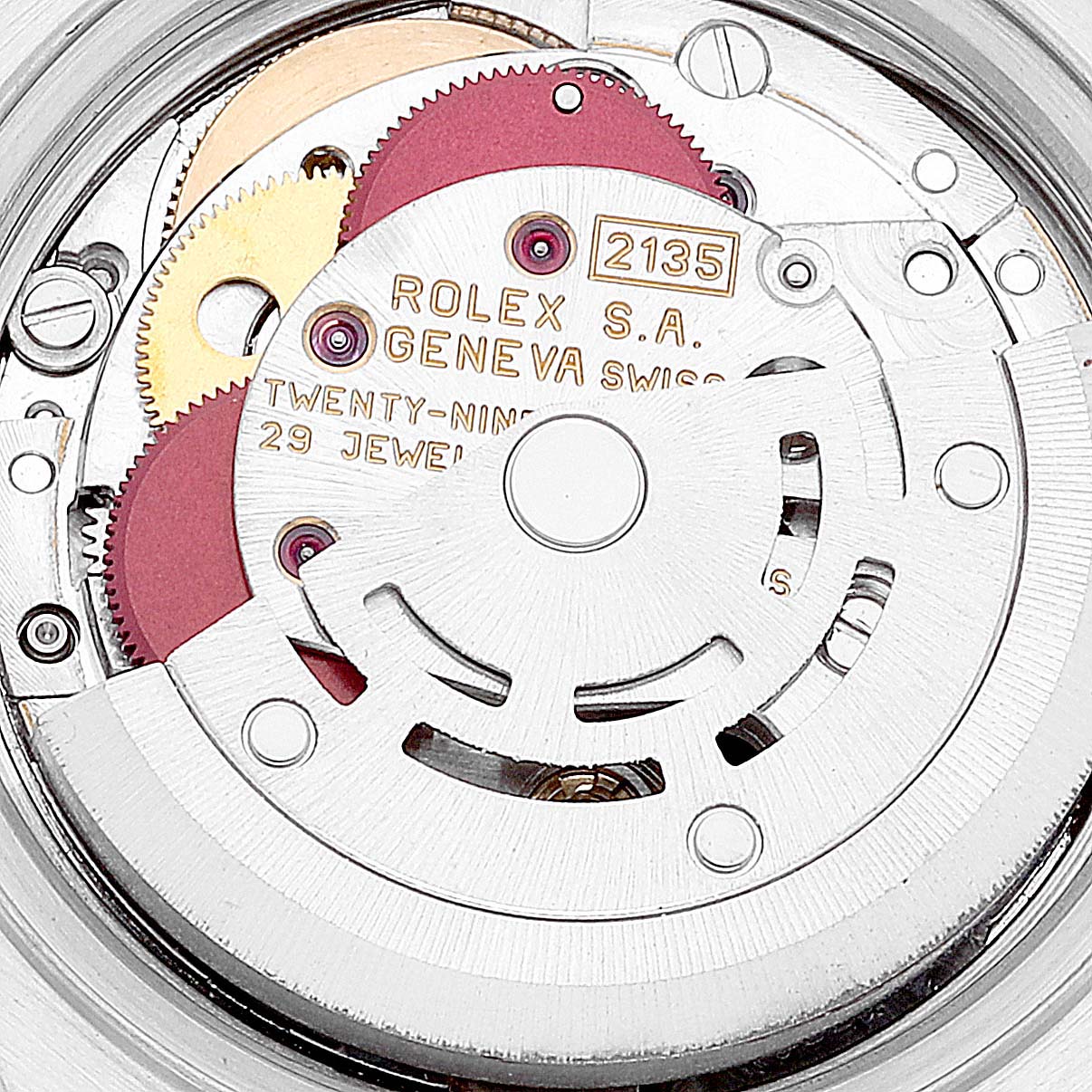 This image shows a close-up of the movement mechanism of a Rolex Datejust 69173 Women's Steel and Gold (two tone) White Dial 69173 Women's Steel and Gold (two tone) White Dial watch, highlighting gears and internal components.