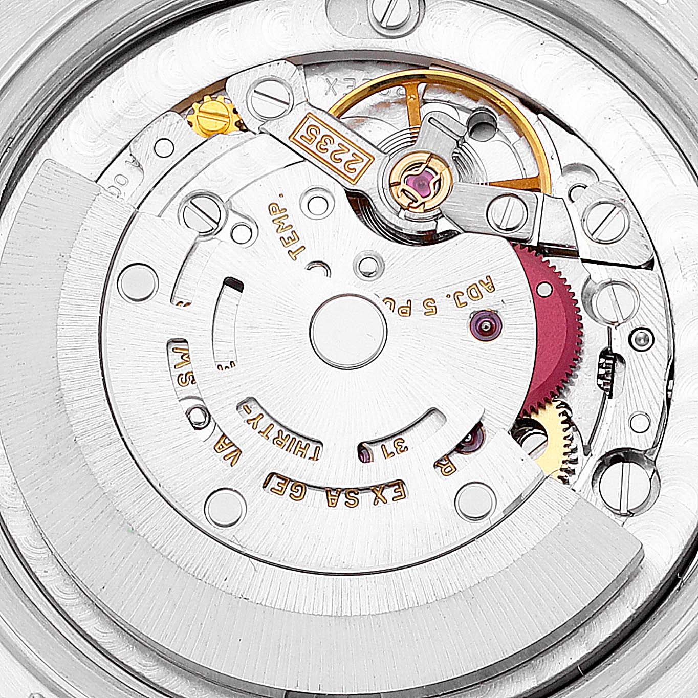 The image shows a close-up view of the Rolex Mid-Size 78240 Women
s Stainless Steel Black Dial 78240 Women
s Stainless Steel Black Dial watch
s movement mechanism, highlighting the intricate internal components.
