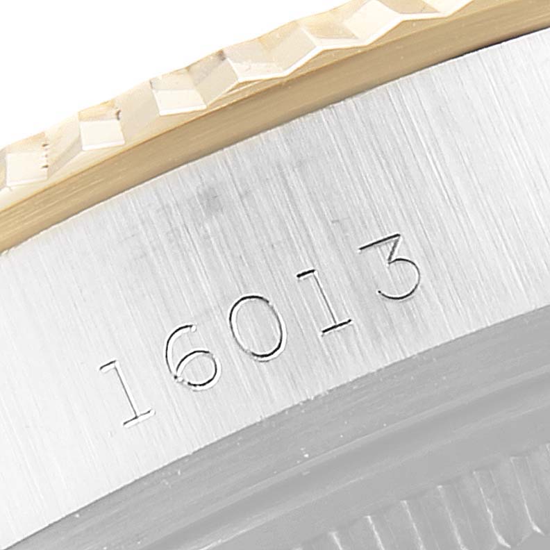 The image shows the side of the case and bezel of a Vintage Collection Rolex model 16013.