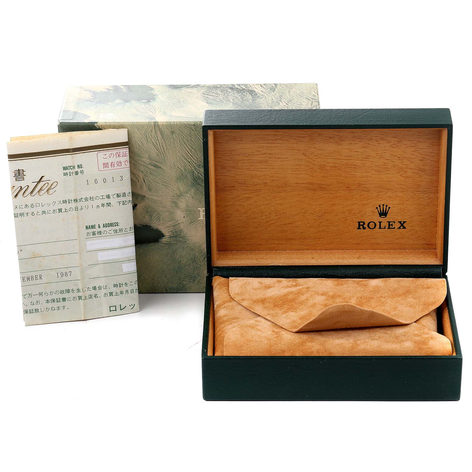 The image shows the box and warranty card for a Vintage Collection model by Rolex, viewed from the top.