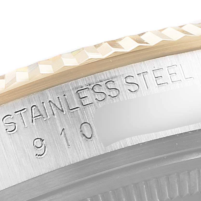 This image shows a close-up of the stainless steel casing with a partial serial number from a Rolex Vintage Collection 16013 Men
s Steel and Gold (two tone) Black Dial 16013 Men
s Steel and Gold (two tone) Black Dial model.