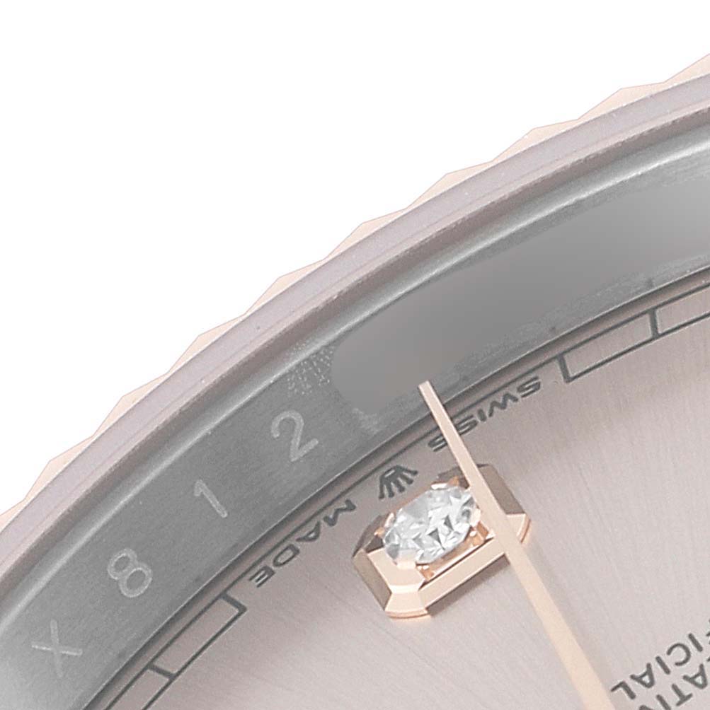 This is a close-up view of the dial and bezel of a Rolex Datejust 41 126331 Men's Steel and Gold (two tone) Beige Dial 126331 Men's Steel and Gold (two tone) Beige Dial watch.