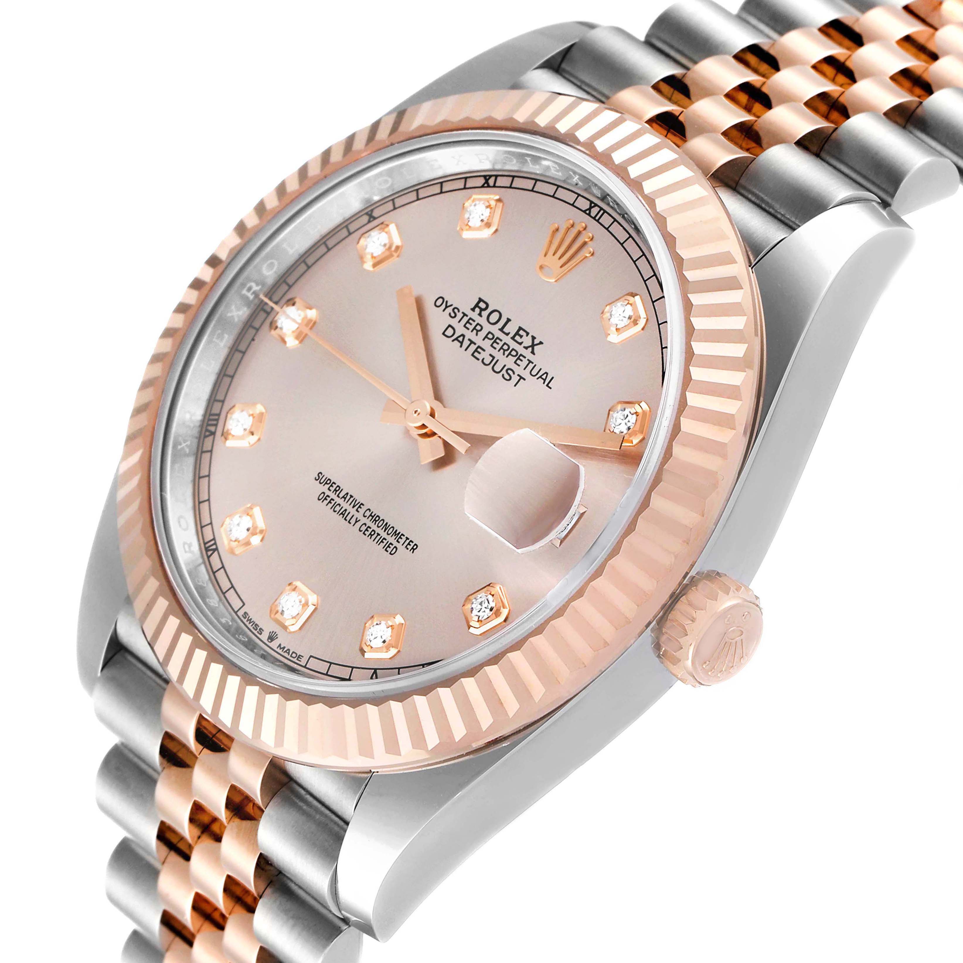 This image shows the Rolex Datejust 41 126331 Men's Steel and Gold (two tone) Beige Dial 126331 Men's Steel and Gold (two tone) Beige Dial watch in an angled close-up, highlighting the dial, fluted bezel, and part of the bracelet.