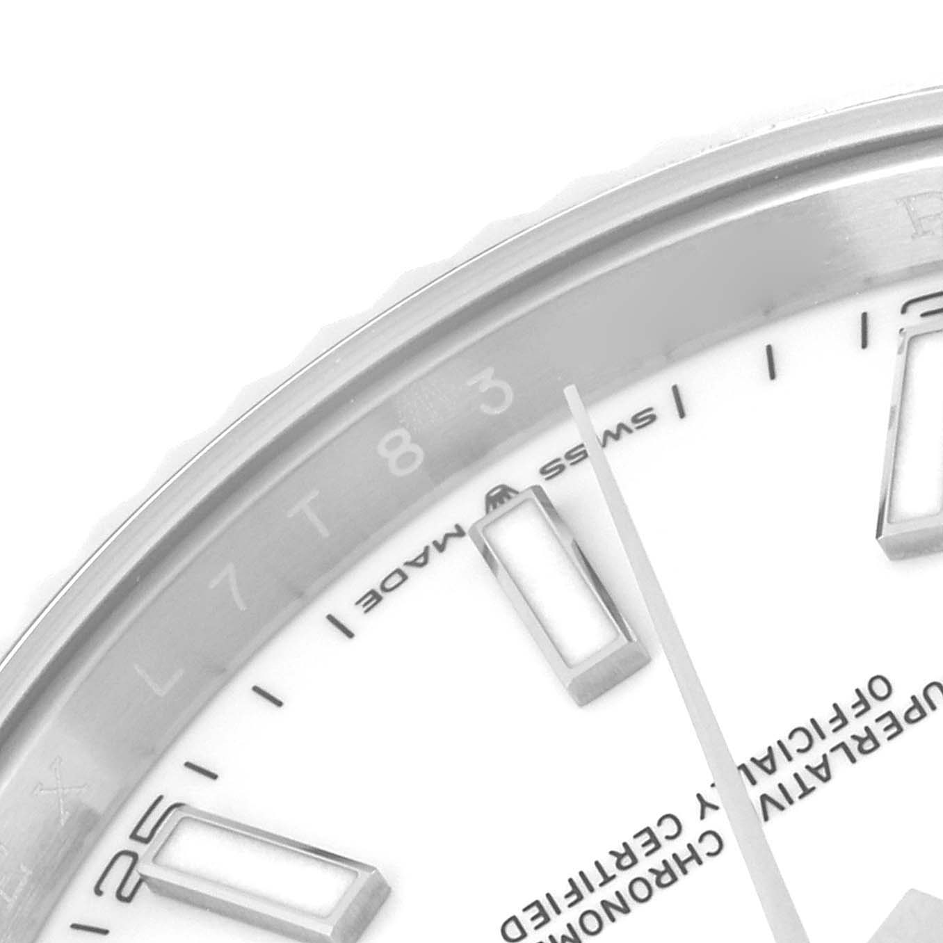 This image shows a close-up of the dial and bezel of a Rolex Datejust 41 126334 Men
s Stainless Steel White Dial 126334 Men
s Stainless Steel White Dial, highlighting the Swiss Made label and hour markers.