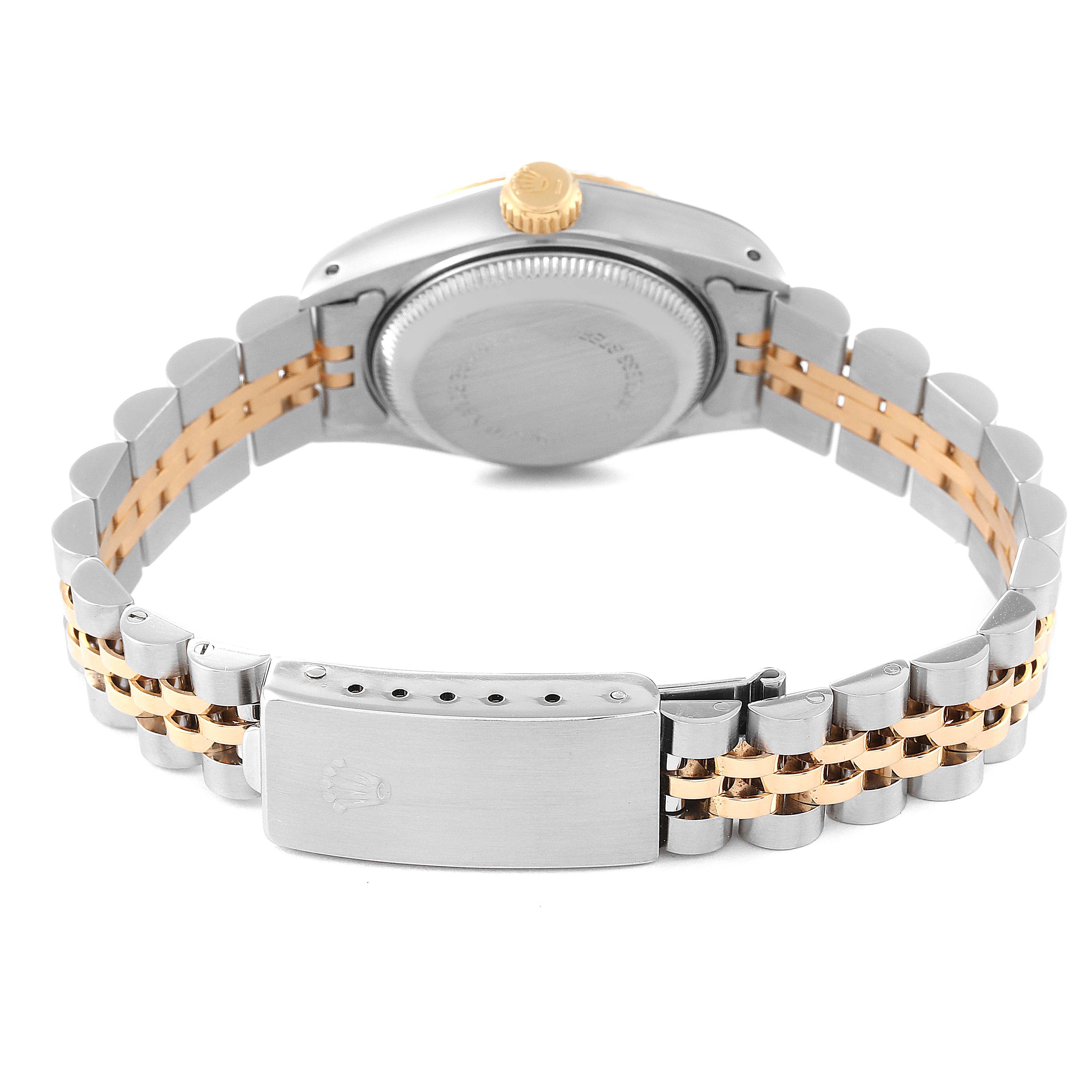 The image shows the back view and the clasp of a Rolex Datejust 69173 Women's Steel and Gold (two tone) Champagne Dial 69173 Women's Steel and Gold (two tone) Champagne Dial watch, highlighting its two-tone bracelet and case back.