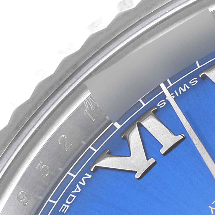 This image shows a close-up angle of the bezel, dial, and Roman numeral marker of the Rolex Datejust 41 116334 Men's Stainless Steel Blue Dial 116334 Men's Stainless Steel Blue Dial watch.