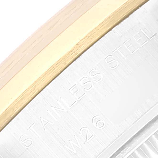 This image shows a close-up of the side of a Rolex Datejust 69163 Women's Steel and Gold (two tone) Champagne Dial 69163 Women's Steel and Gold (two tone) Champagne Dial watch case, highlighting the "Stainless Steel" engraving.