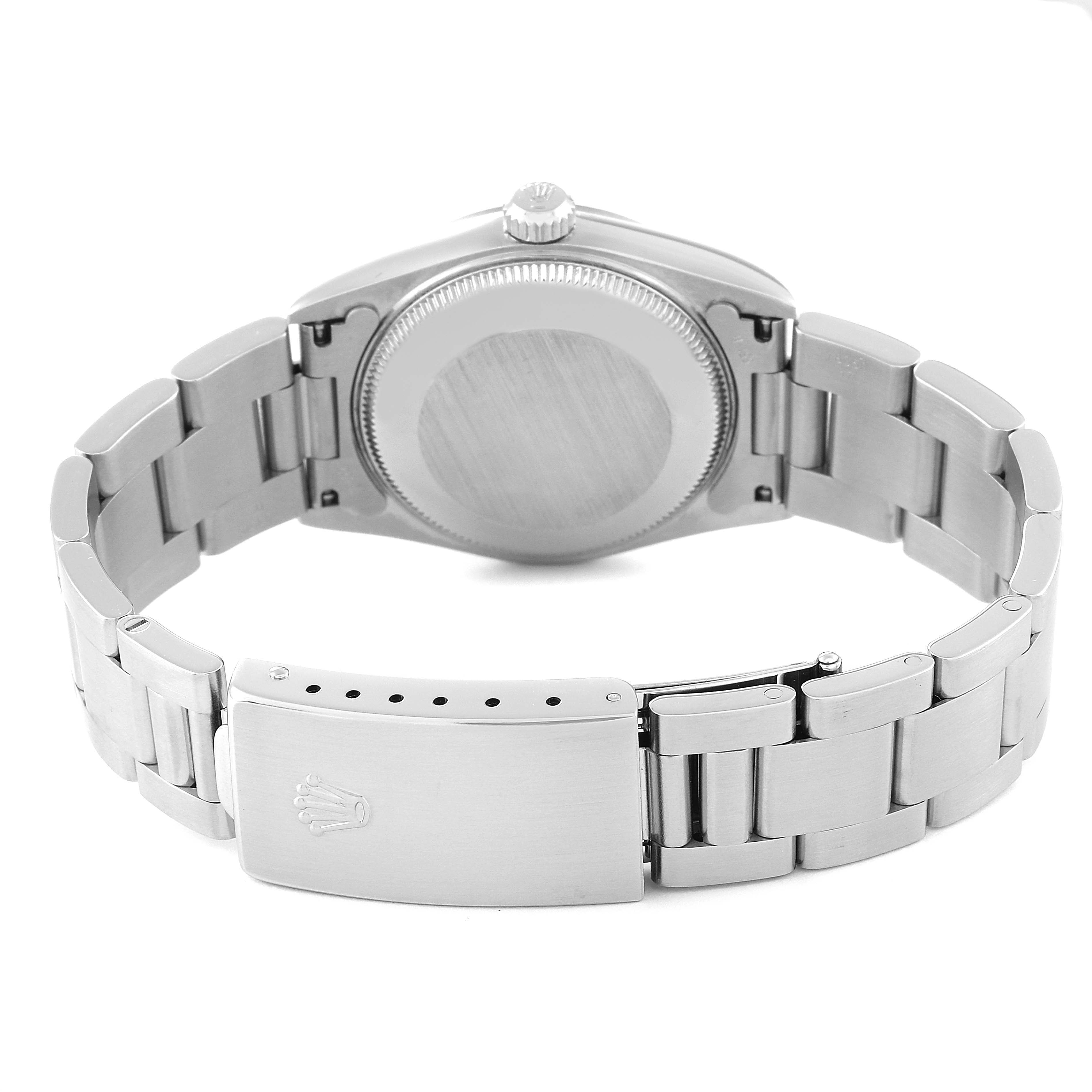 The image shows the back view of a Rolex Mid-Size 68240 Women
s Stainless Steel Blue Dial 68240 Women
s Stainless Steel Blue Dial model watch, highlighting the case back, bracelet, and clasp.