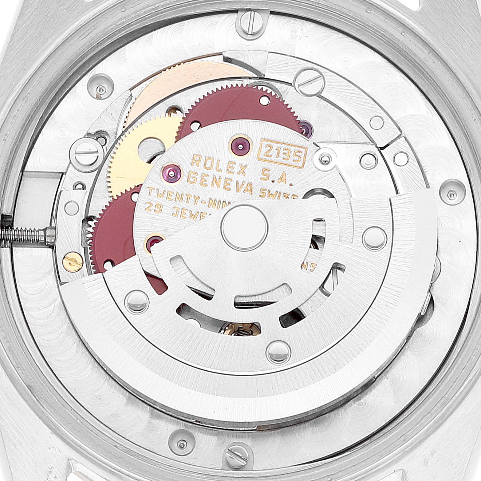 This image shows a close-up view of the movement inside a Rolex Mid-Size 68273 Women
s Steel and Gold (two tone) Champagne Dial 68273 Women
s Steel and Gold (two tone) Champagne Dial watch, highlighting its internal mechanical components.