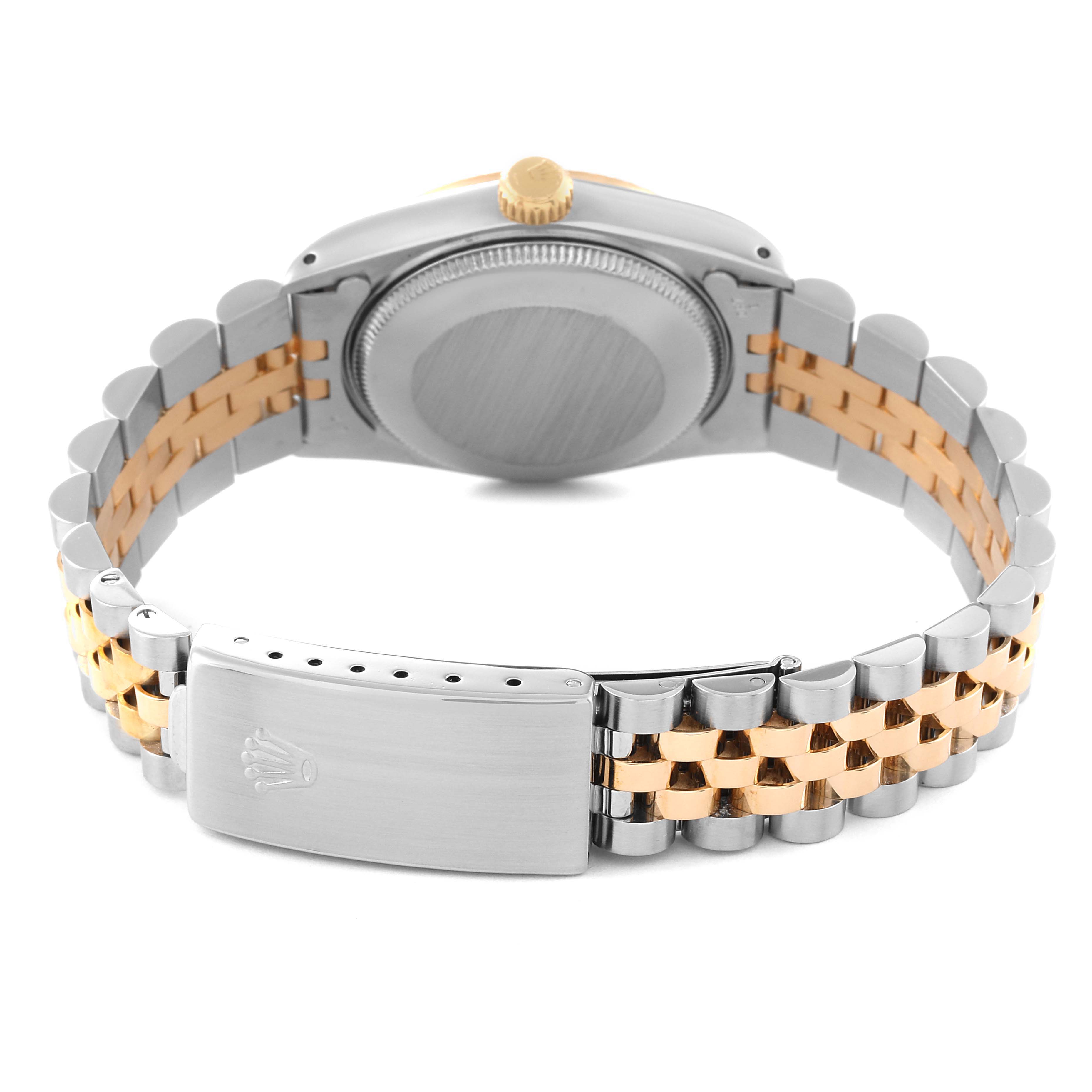 This image shows the back case, bracelet, and clasp of a Rolex Mid-Size 68273 Women
s Steel and Gold (two tone) Champagne Dial 68273 Women
s Steel and Gold (two tone) Champagne Dial watch from a rear angle.