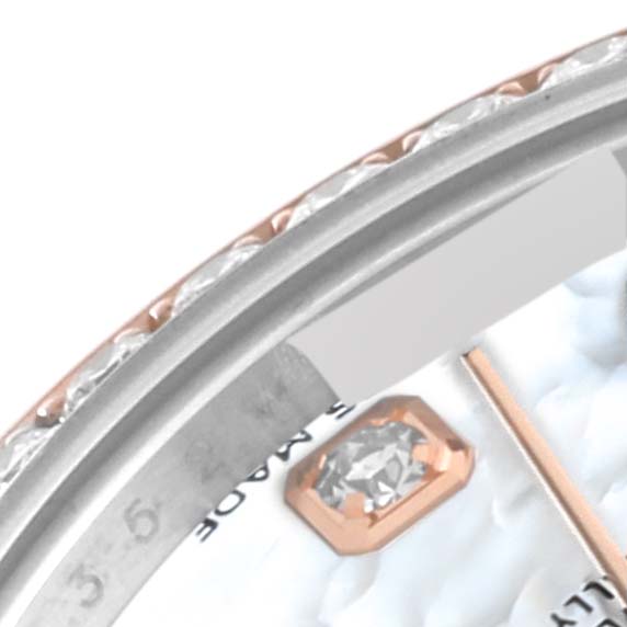 The image shows a close-up of the bezel and part of the dial with a diamond marker of a Rolex Datejust 279381 Women's Steel and Gold (two tone) Mother of Pearl Dial 279381 Women's Steel and Gold (two tone) Mother of Pearl Dial watch.