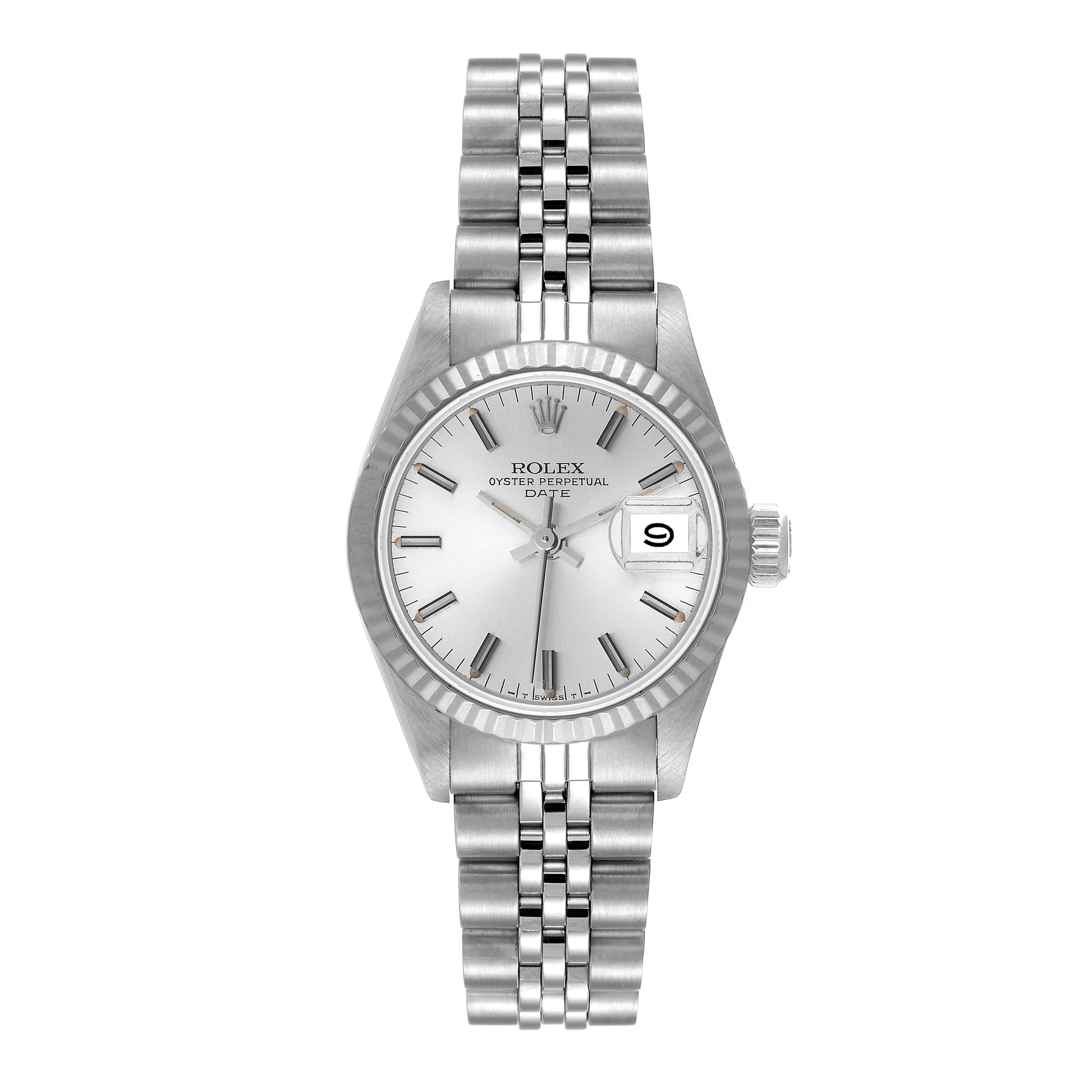 The Rolex Date 69174 Women
s Stainless Steel Silver Dial 69174 Women
s Stainless Steel Silver Dial watch is shown from a top-down angle, displaying the dial, bezel, case, bracelet, and crown.