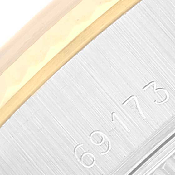 This close-up angle of the Rolex Datejust 69173 Women's Steel and Gold (two tone) Champagne Dial 69173 Women's Steel and Gold (two tone) Champagne Dial model shows the side of the case with part of the reference number "69173."