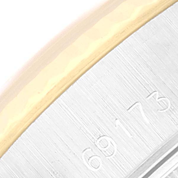The image shows a close-up of the serial number and bezel edge of a Rolex Datejust 69173 Women's Steel and Gold (two tone) Champagne Dial 69173 Women's Steel and Gold (two tone) Champagne Dial watch.