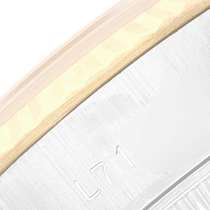 The image shows a close-up of the side case and bezel of a Rolex Datejust 69173 Women's Steel and Gold (two tone) Champagne Dial 69173 Women's Steel and Gold (two tone) Champagne Dial watch.