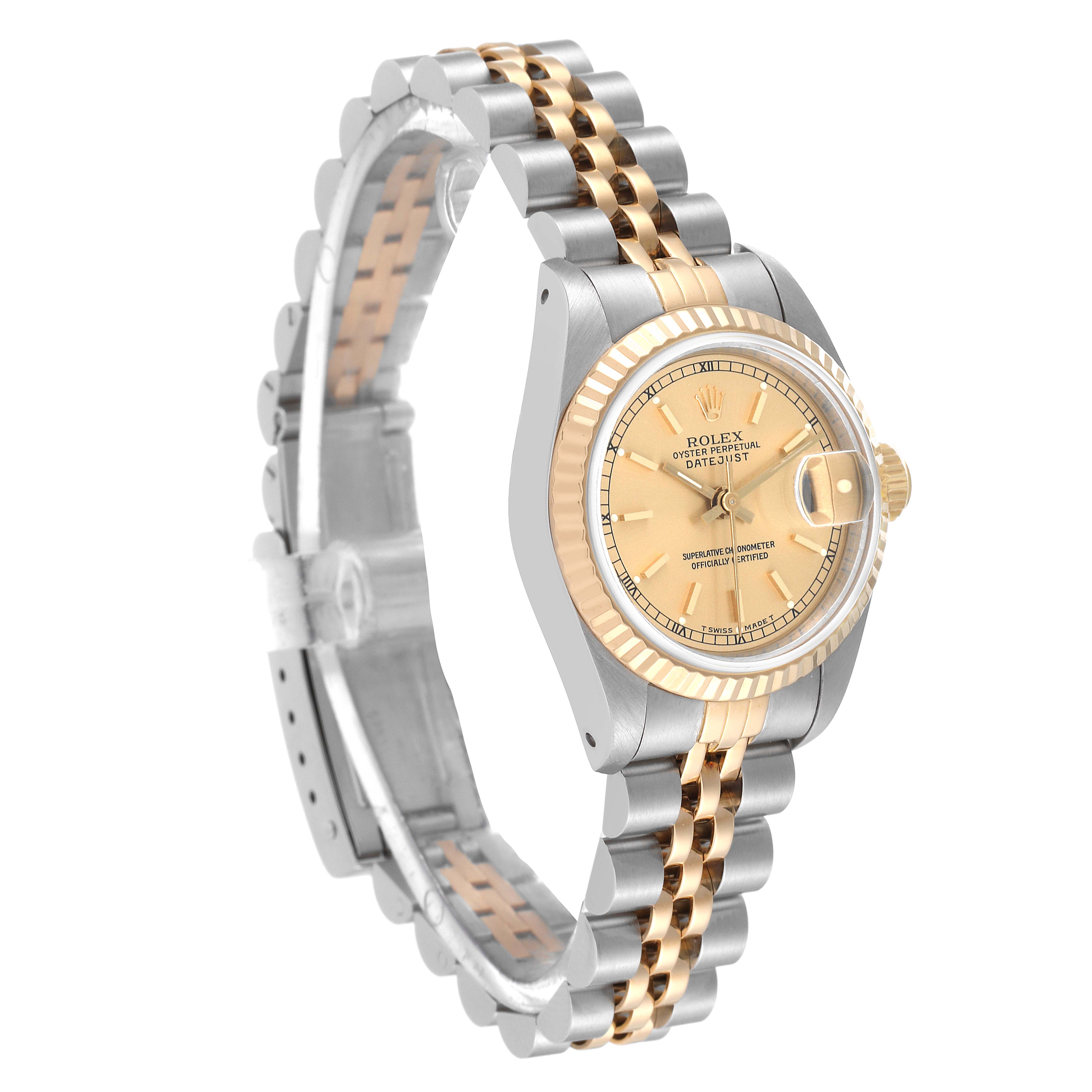 The image shows a Rolex Datejust 69173 Women's Steel and Gold (two tone) Champagne Dial 69173 Women's Steel and Gold (two tone) Champagne Dial watch viewed from an angle, highlighting its face, bezel, and two-tone bracelet.