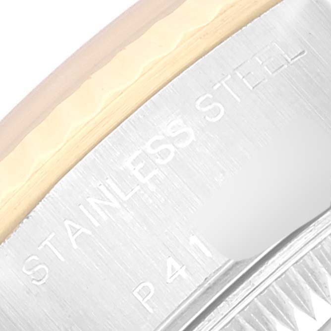 This image shows a close-up of the side of a Rolex Datejust 79173 Women's Steel and Gold (two tone) Champagne Dial 79173 Women's Steel and Gold (two tone) Champagne Dial watch, highlighting its stainless steel and gold construction.