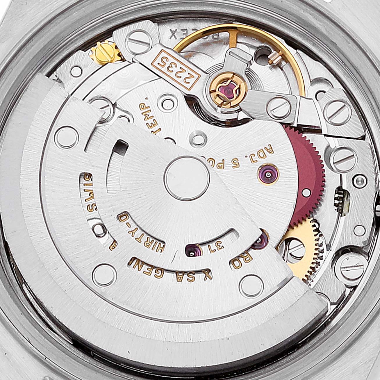 This image shows the internal intricate mechanical movement components of a Rolex Datejust 79173 Women's Steel and Gold (two tone) Champagne Dial 79173 Women's Steel and Gold (two tone) Champagne Dial watch.