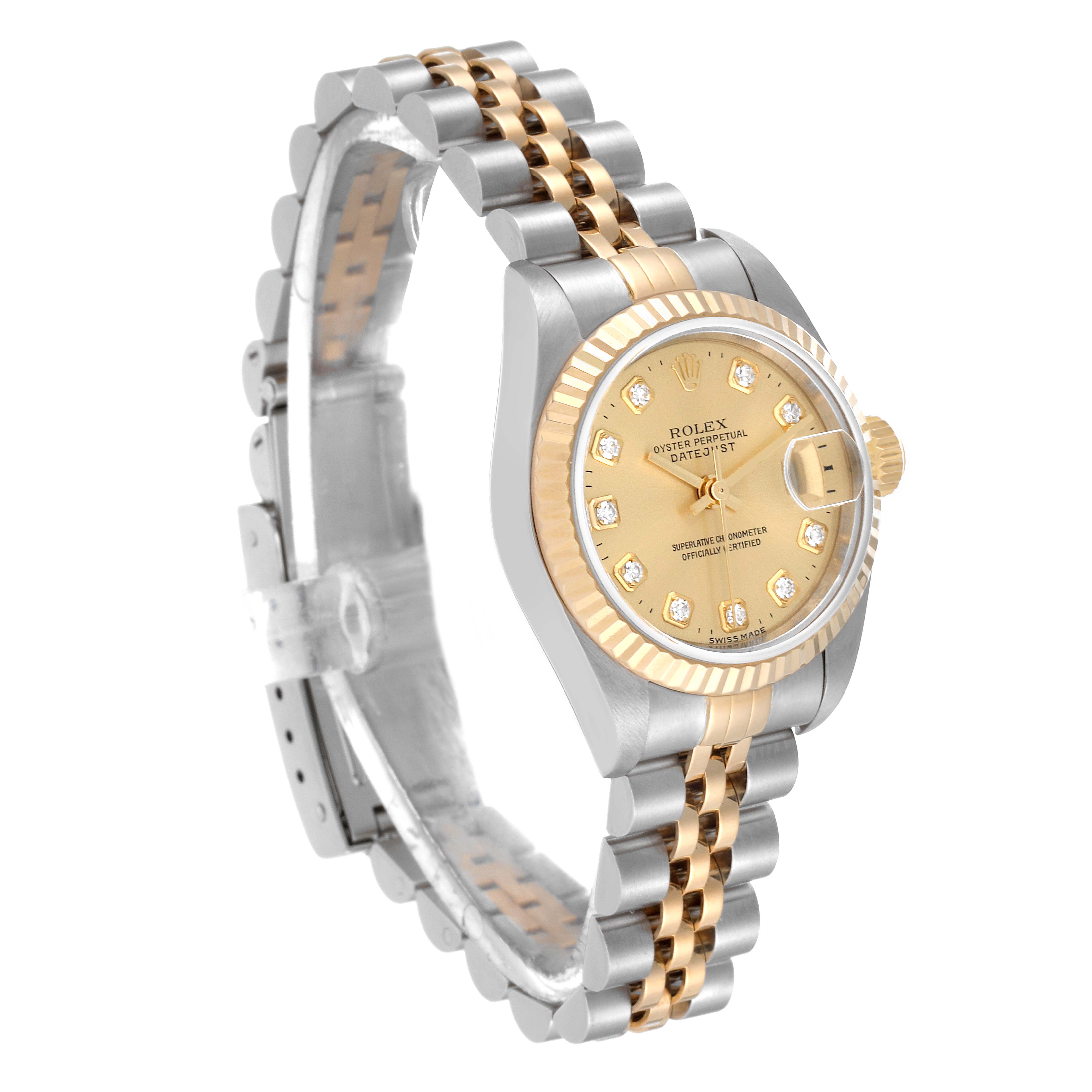 The image shows a Rolex Datejust 79173 Women's Steel and Gold (two tone) Champagne Dial 79173 Women's Steel and Gold (two tone) Champagne Dial watch at an oblique angle, highlighting its two-tone bracelet, fluted bezel, and diamond-studded dial.