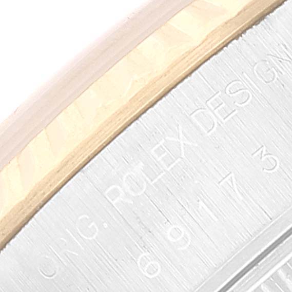 The image shows a close-up of the case back of a Rolex Datejust 69173 Women's Steel and Gold (two tone) Champagne Dial 69173 Women's Steel and Gold (two tone) Champagne Dial, displaying the engraved details.